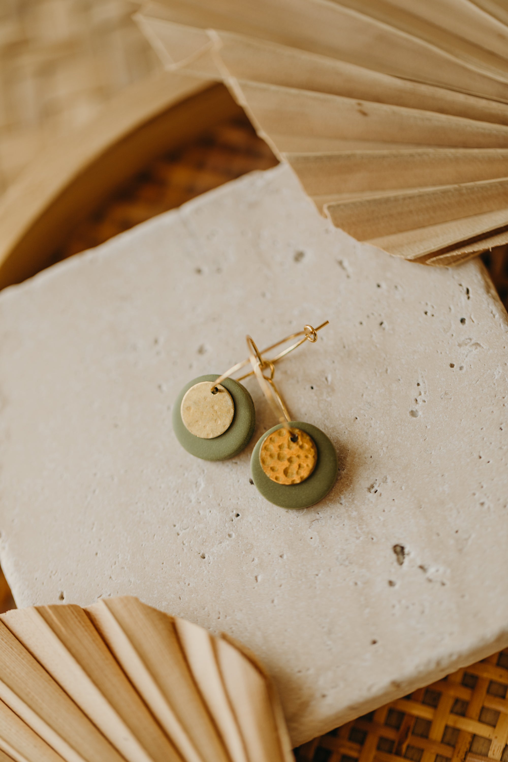 Hoop earrings with round polymer clay pendant and leaf
