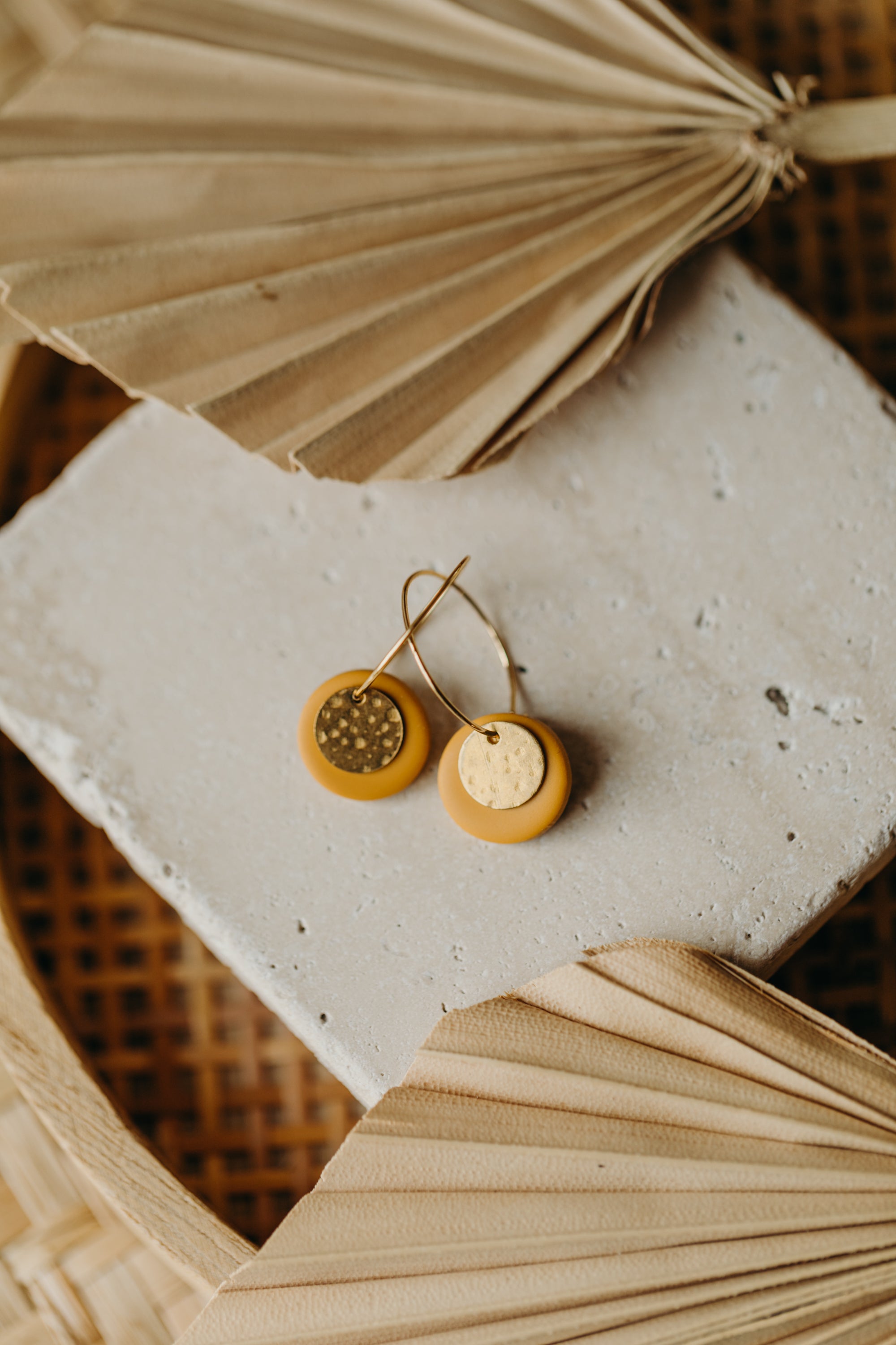 Hoop earrings with round polymer clay pendant and leaf