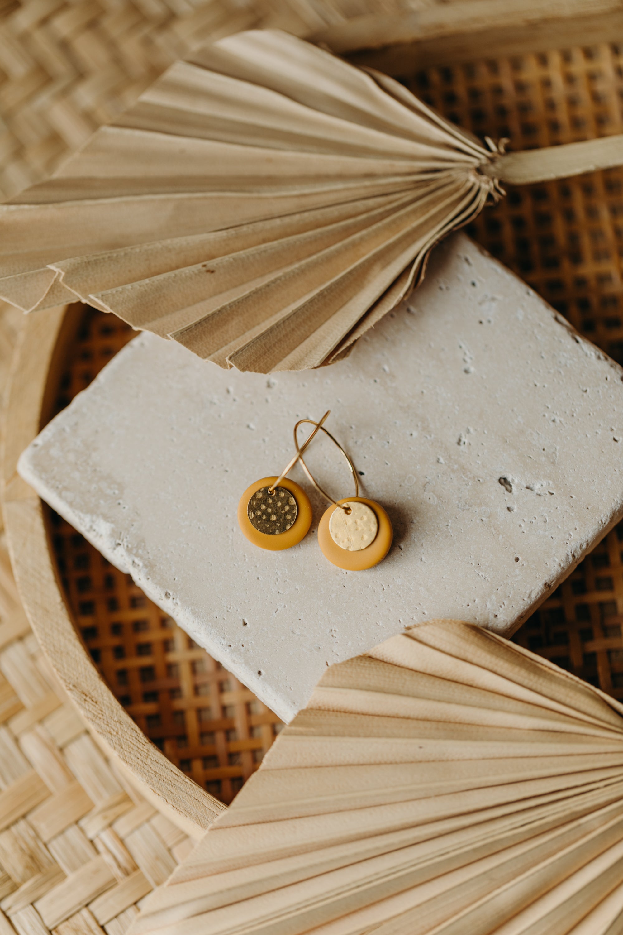 Hoop earrings with round polymer clay pendant and leaf