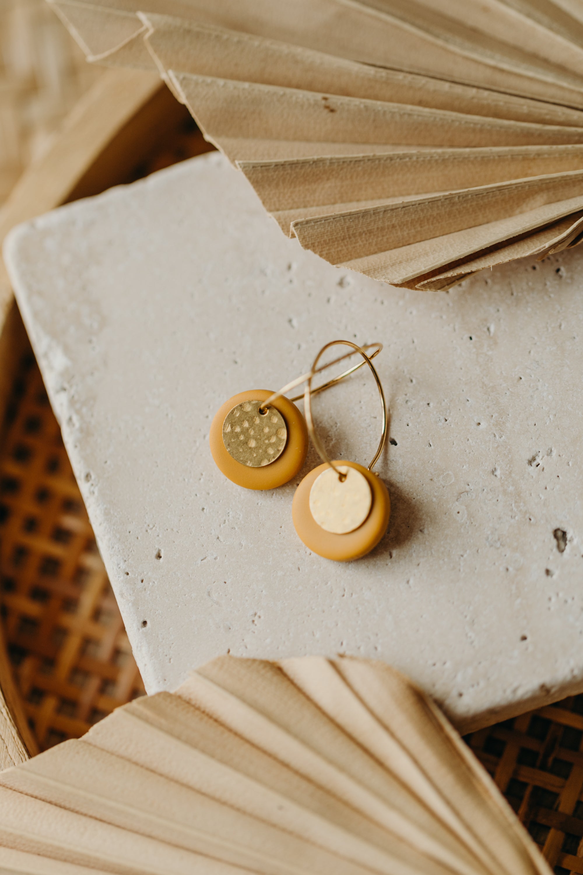 Hoop earrings with round polymer clay pendant and leaf