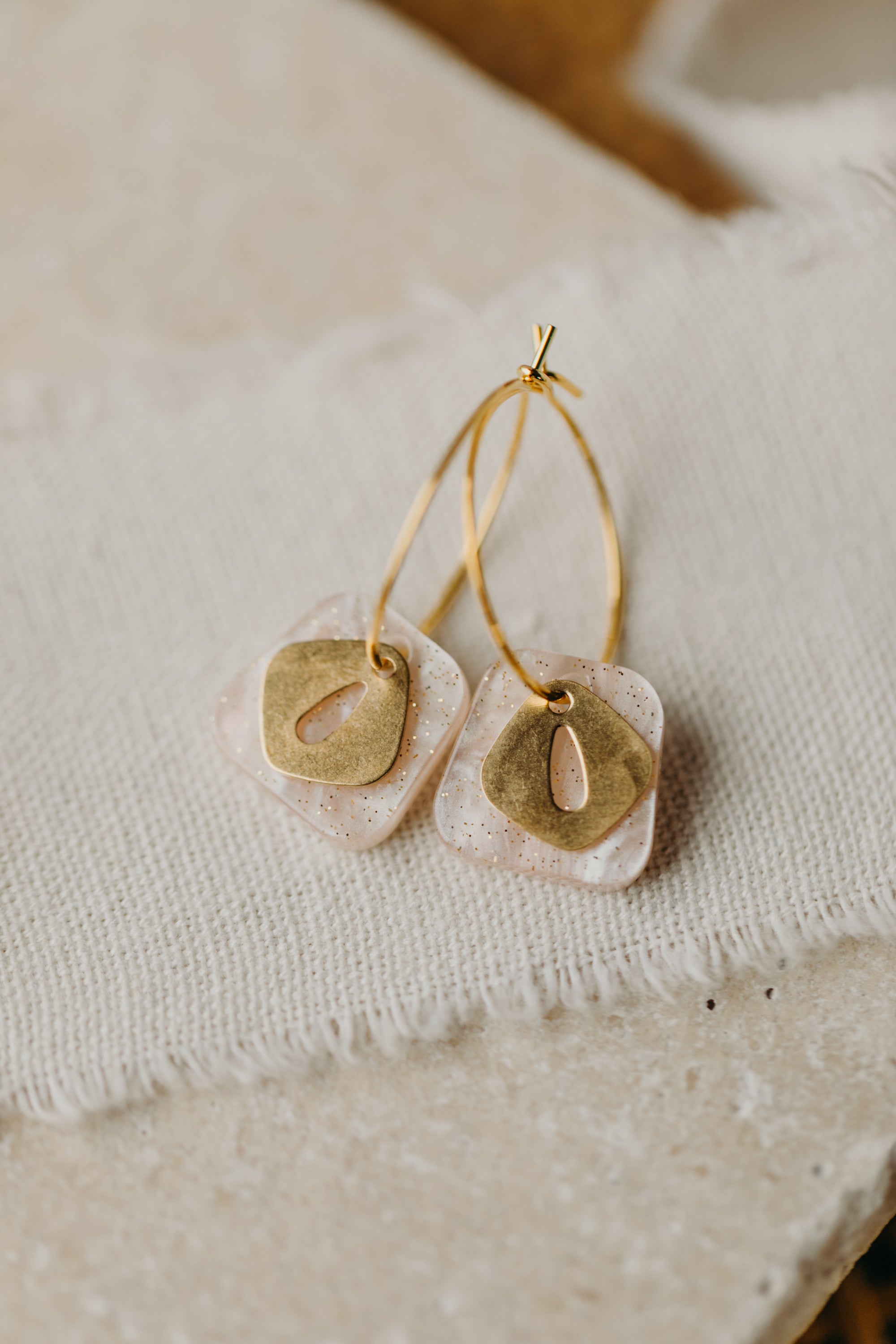 Hoop earrings with pink pendant