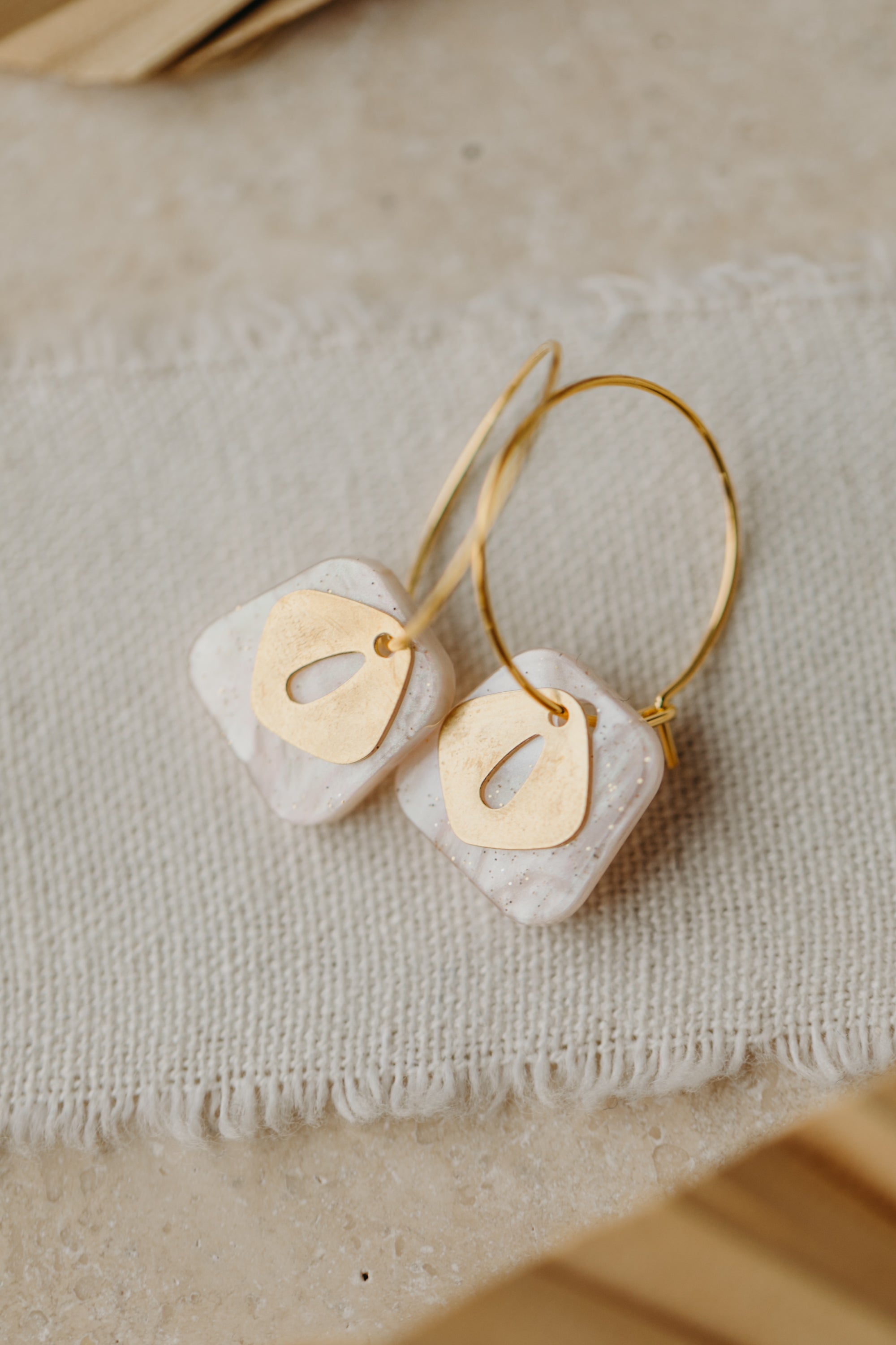 Hoop earrings with pink pendant