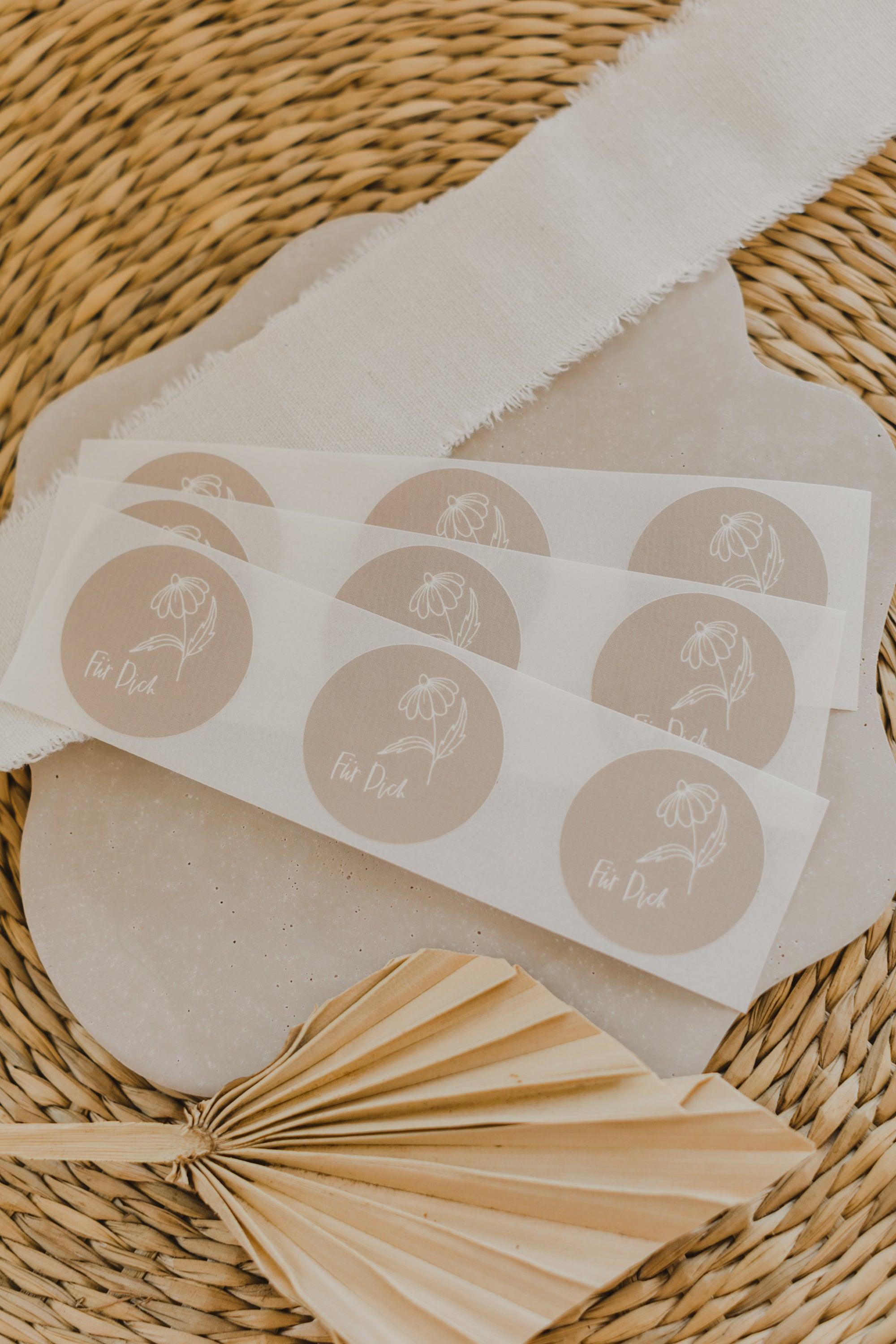 runde beige Aufkleber mit der Aufschrift "Für Dich"