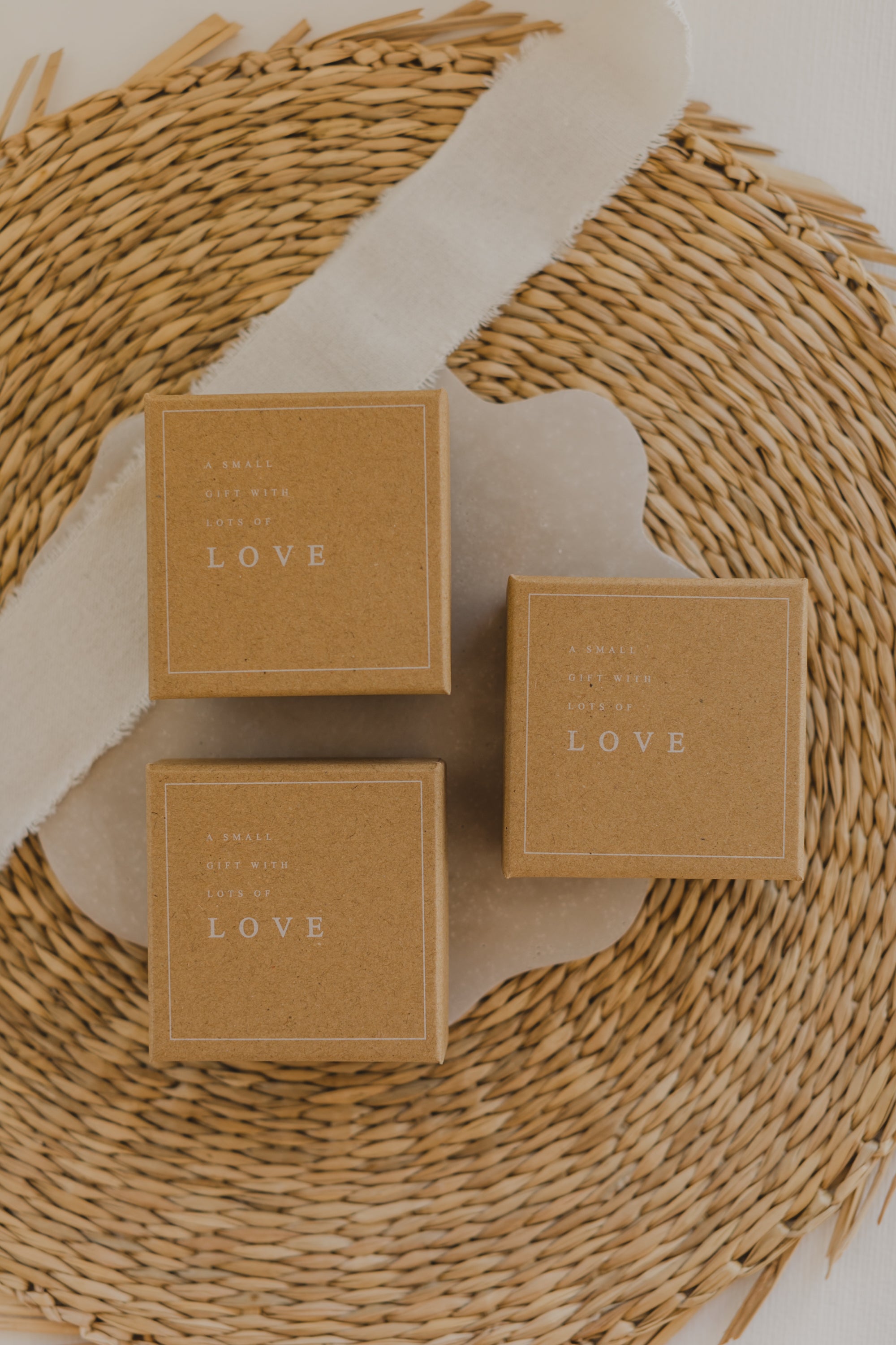 Gift box kraft paper with print "A small gift with lots of Love"