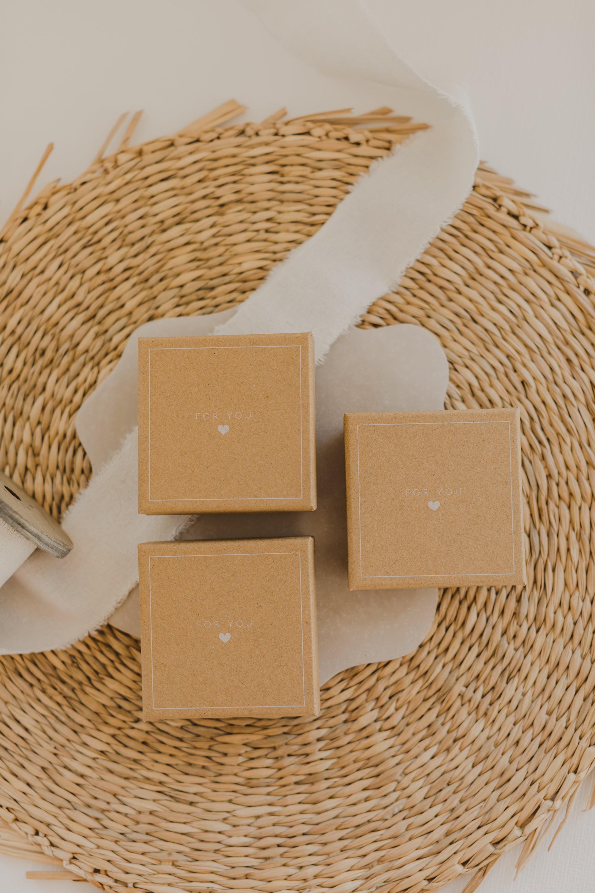 Gift box kraft paper with print "For You" and small white heart