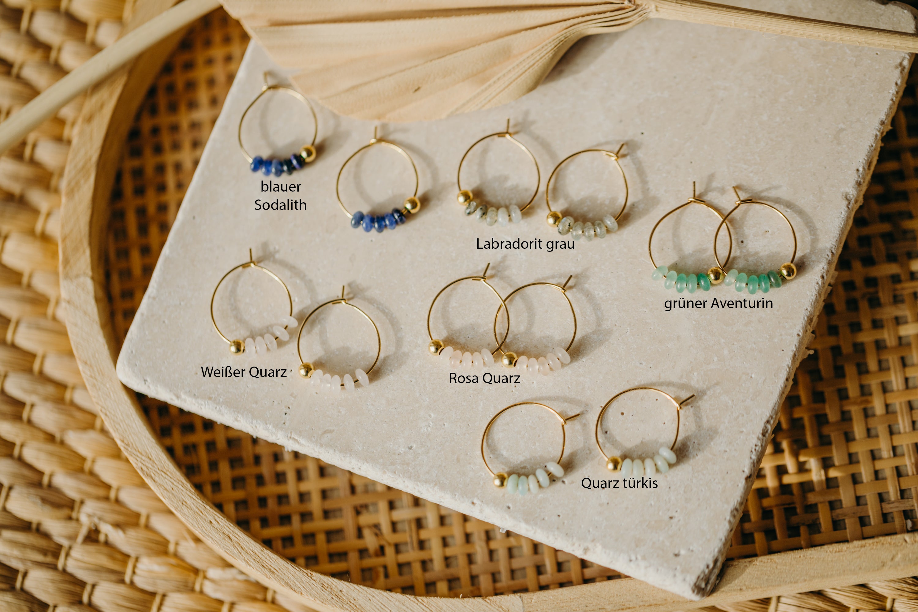 filigree hoop earrings made of titanium with gemstones