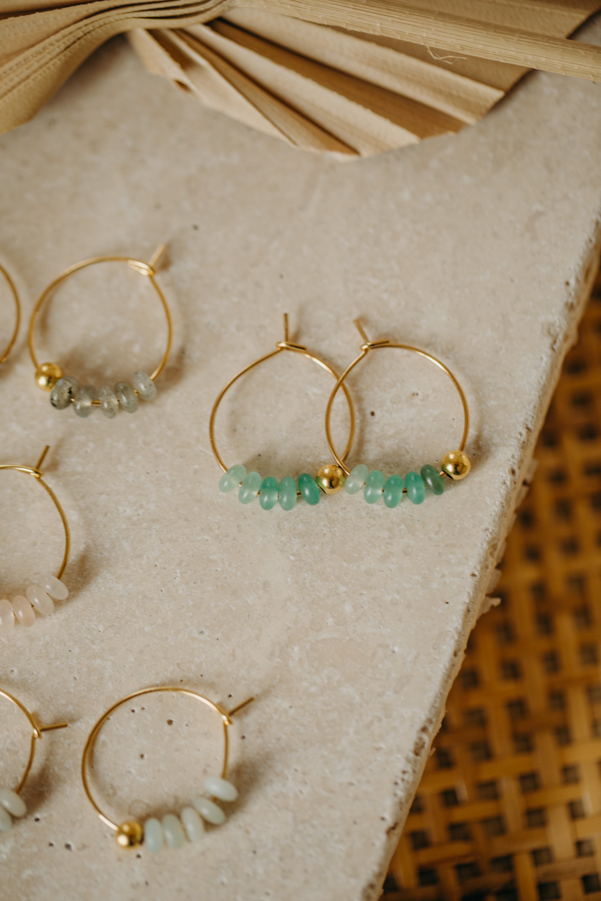 filigree hoop earrings made of titanium with gemstones