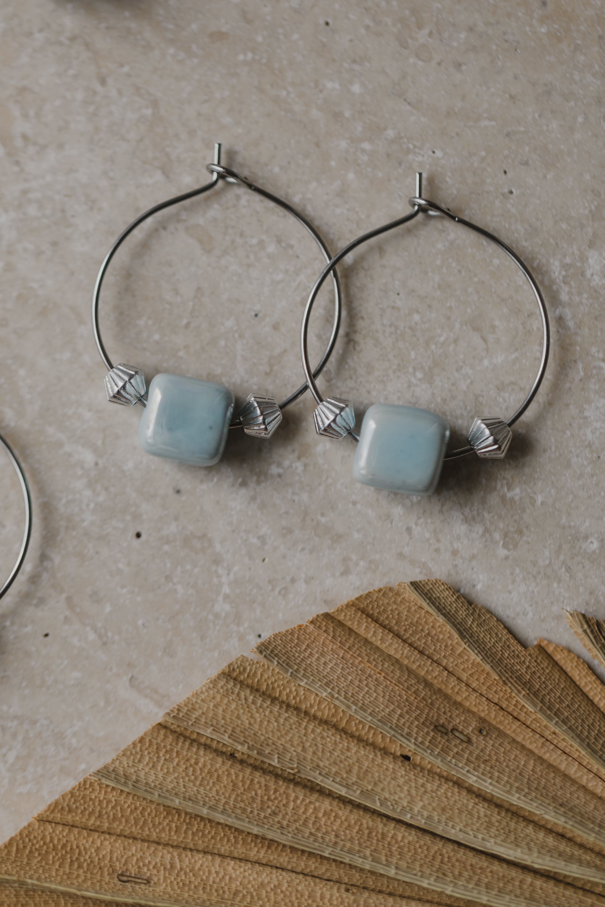 silver hoop earrings with ceramic beads