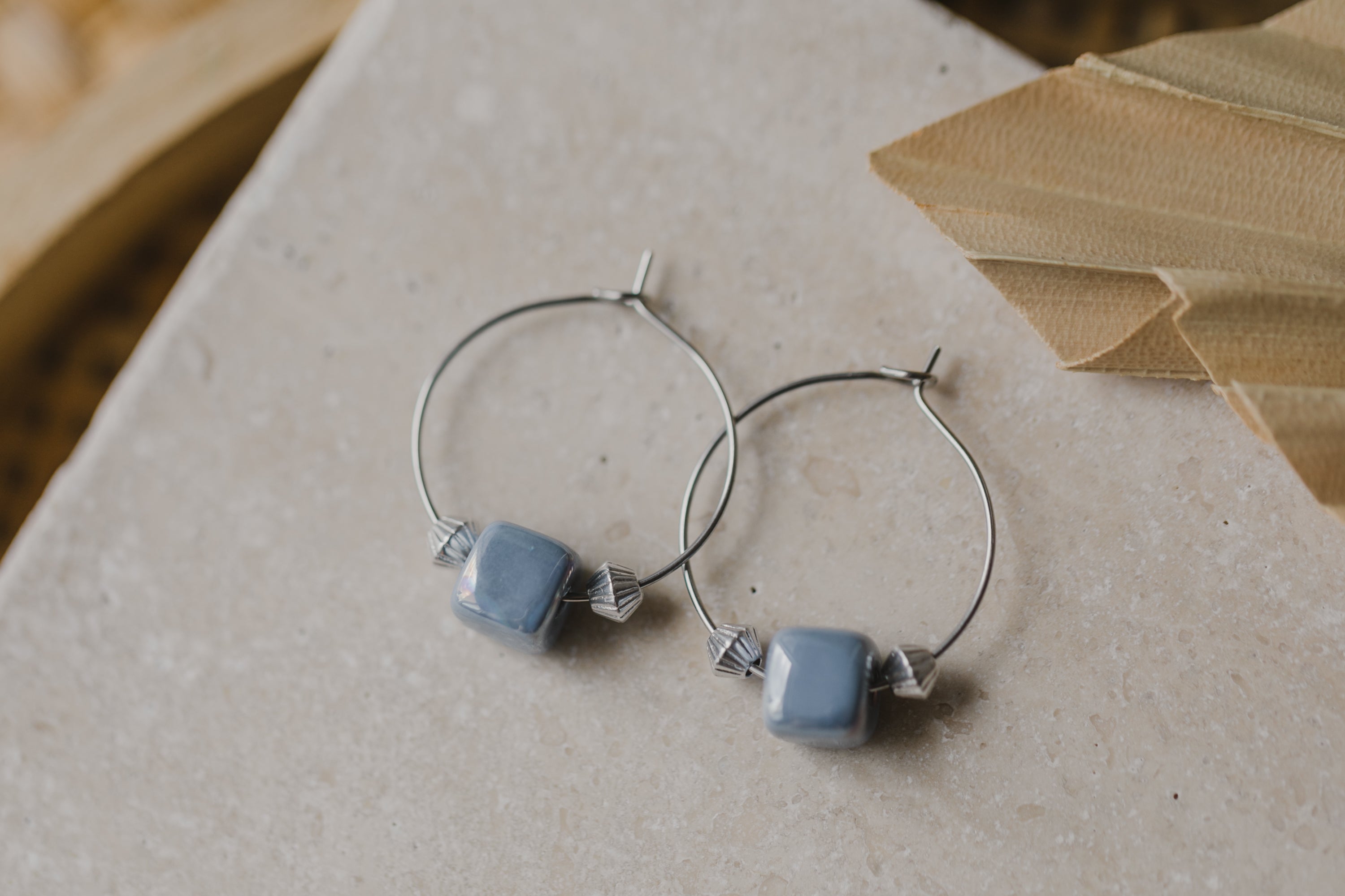 silver hoop earrings with ceramic beads