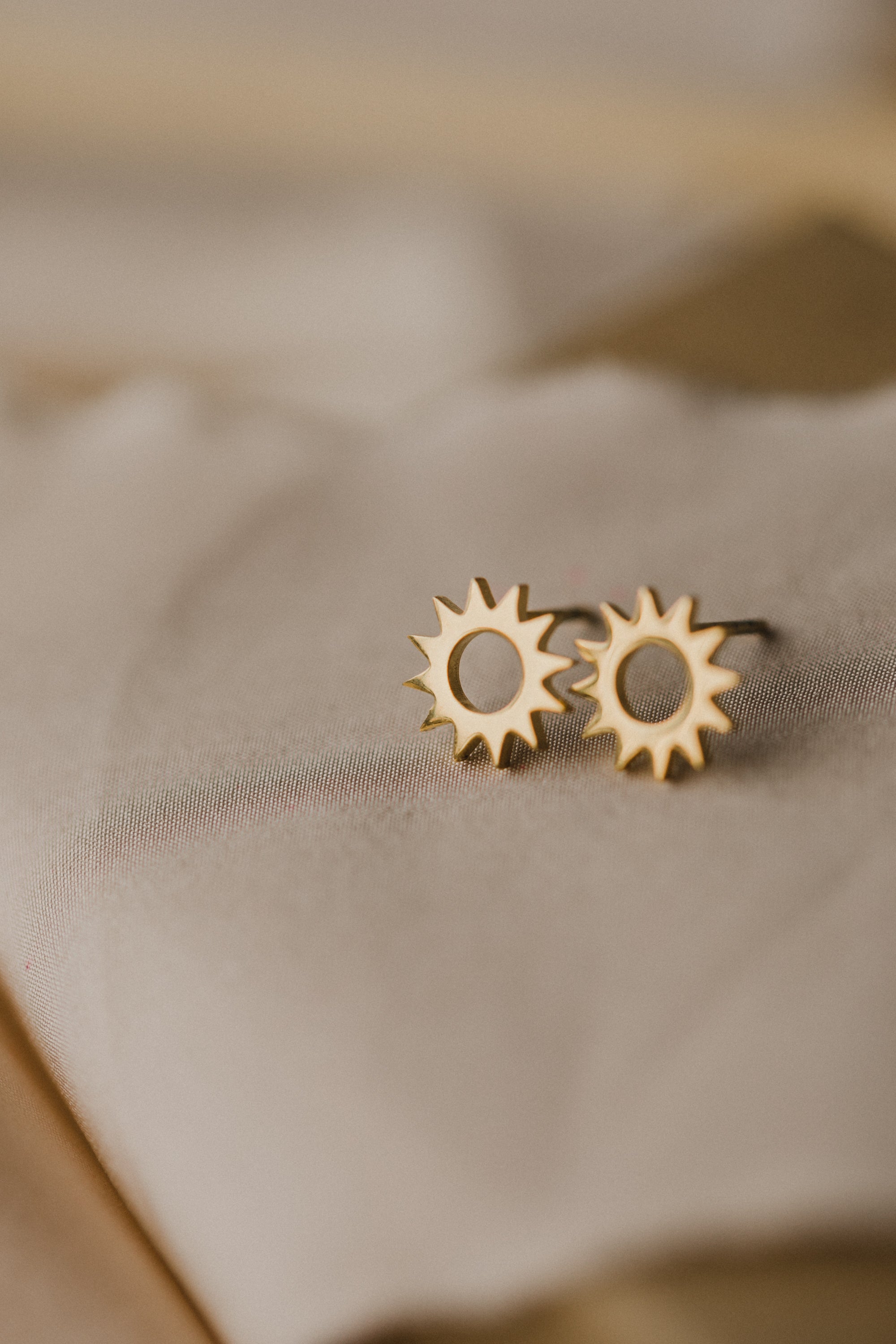 Sun stud earrings