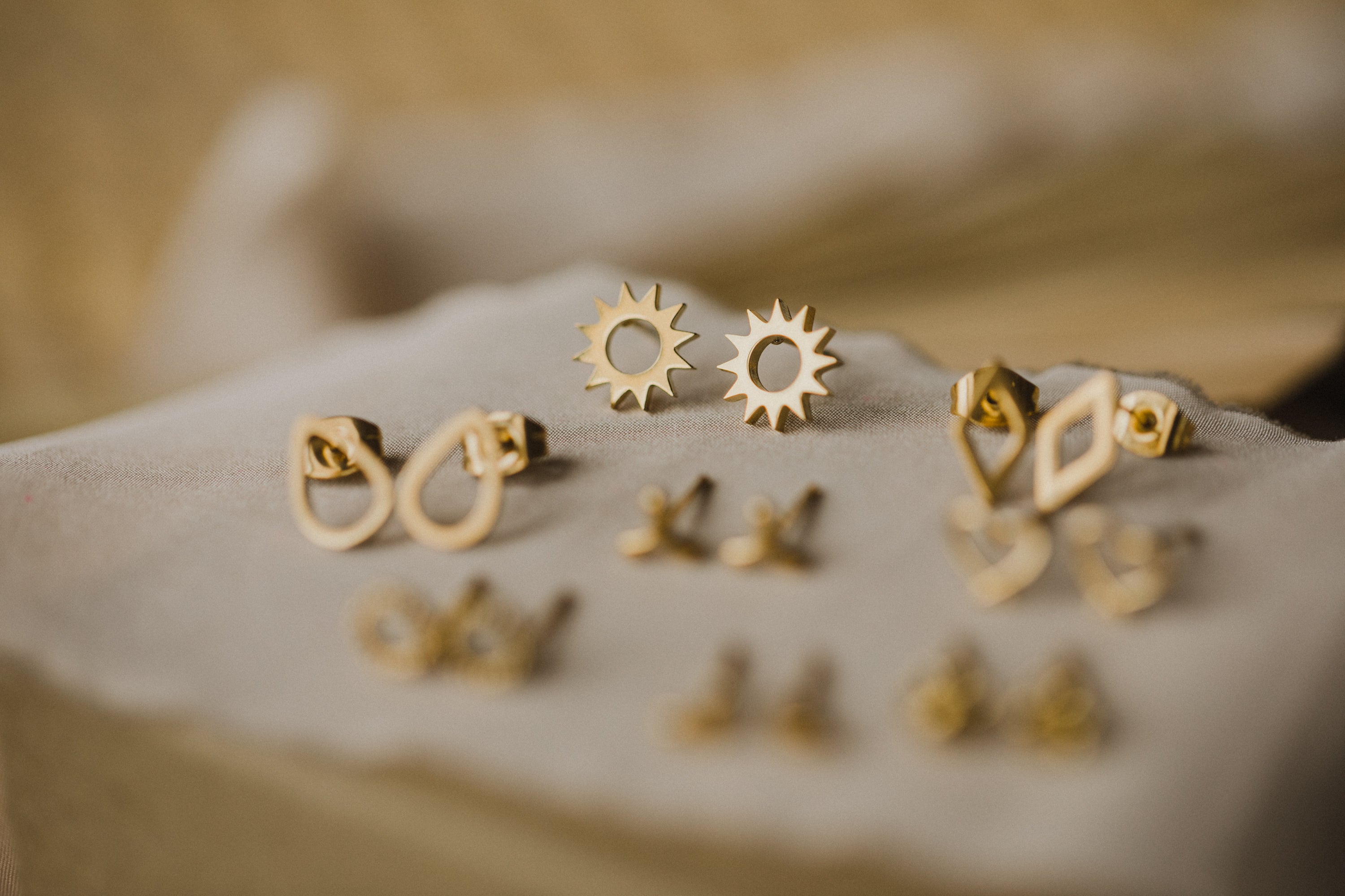 Sun stud earrings