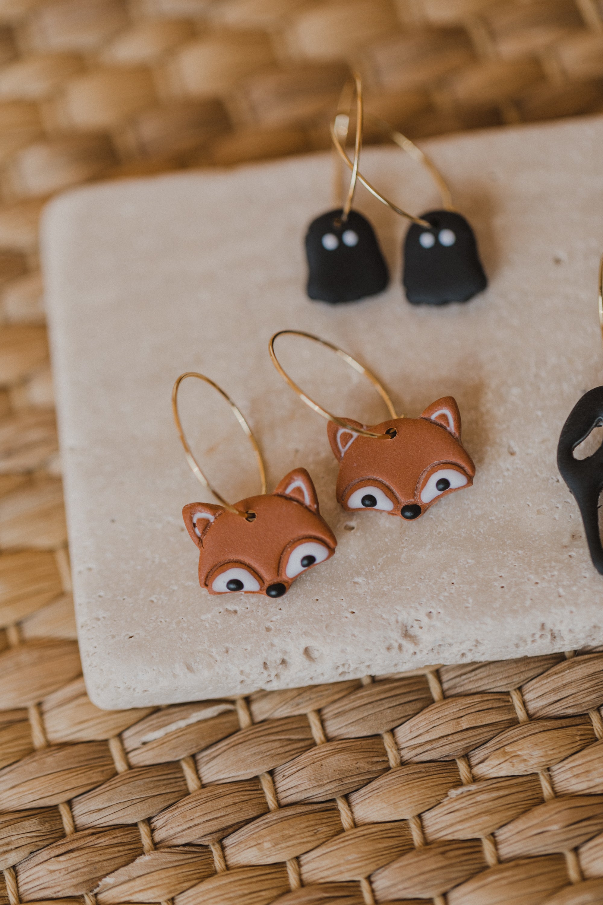 golden earrings with acrylic in white, petrol and brown