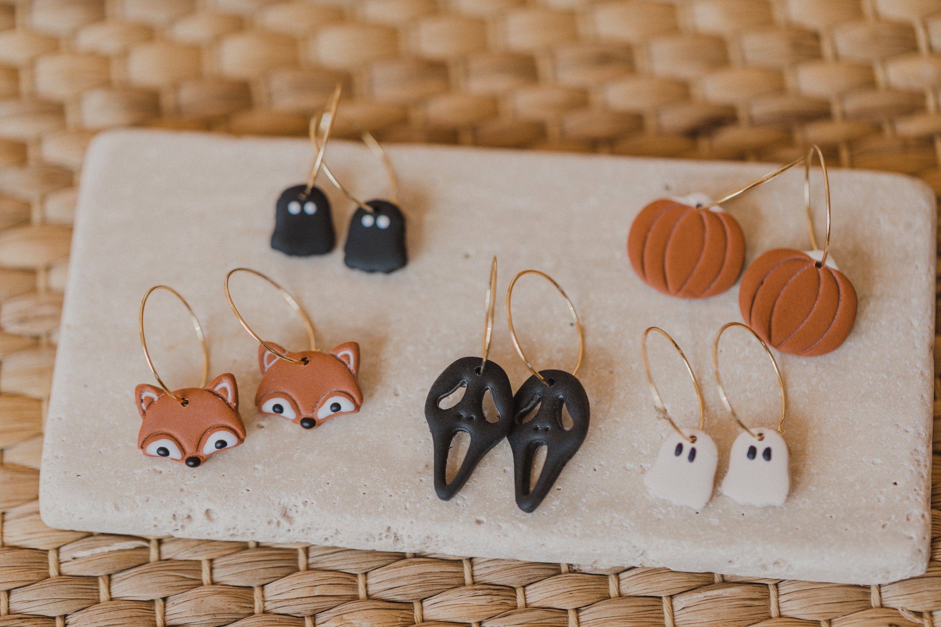 golden earrings with acrylic in white, petrol and brown