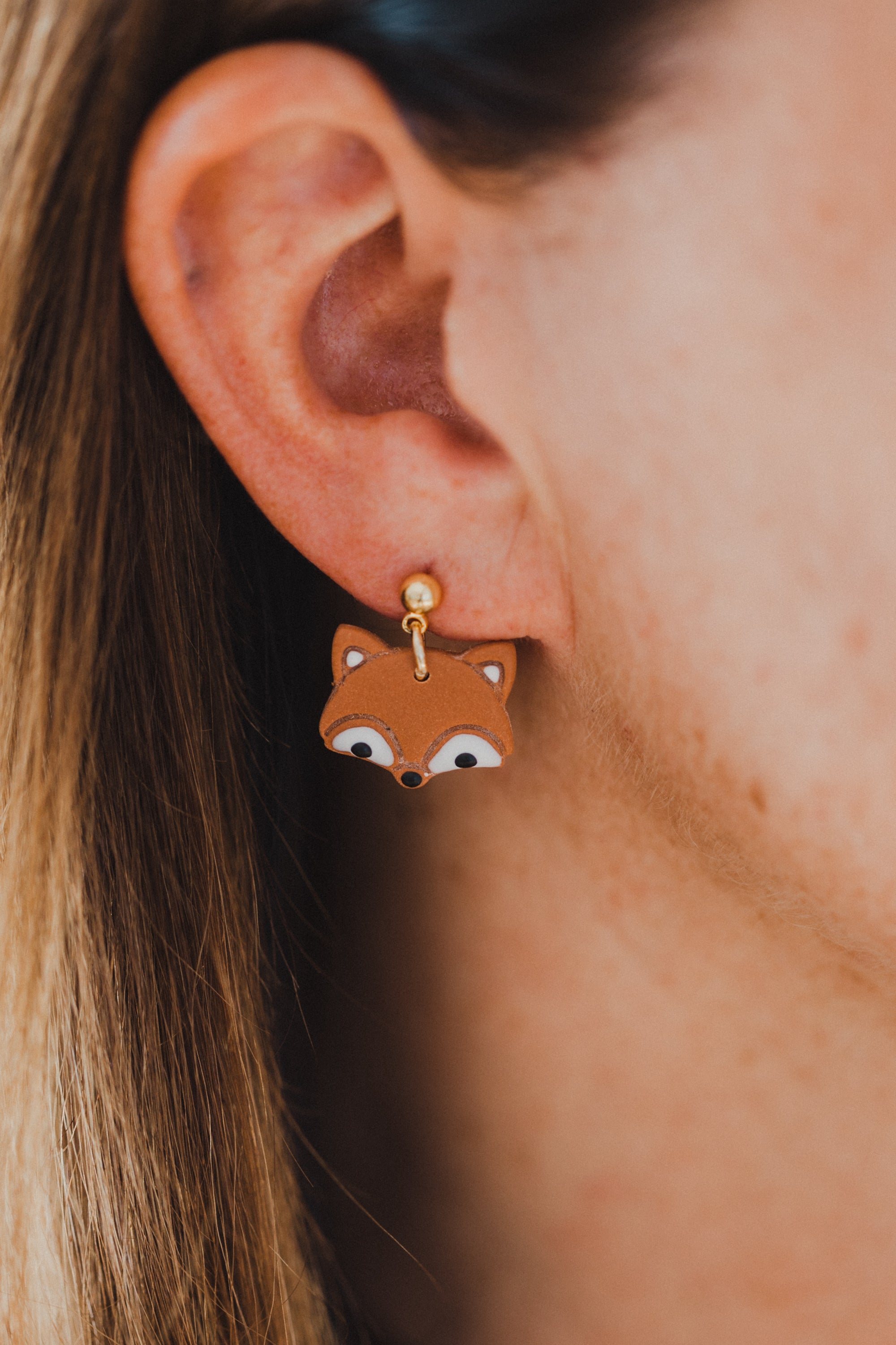 golden earrings with acrylic in white, petrol and brown