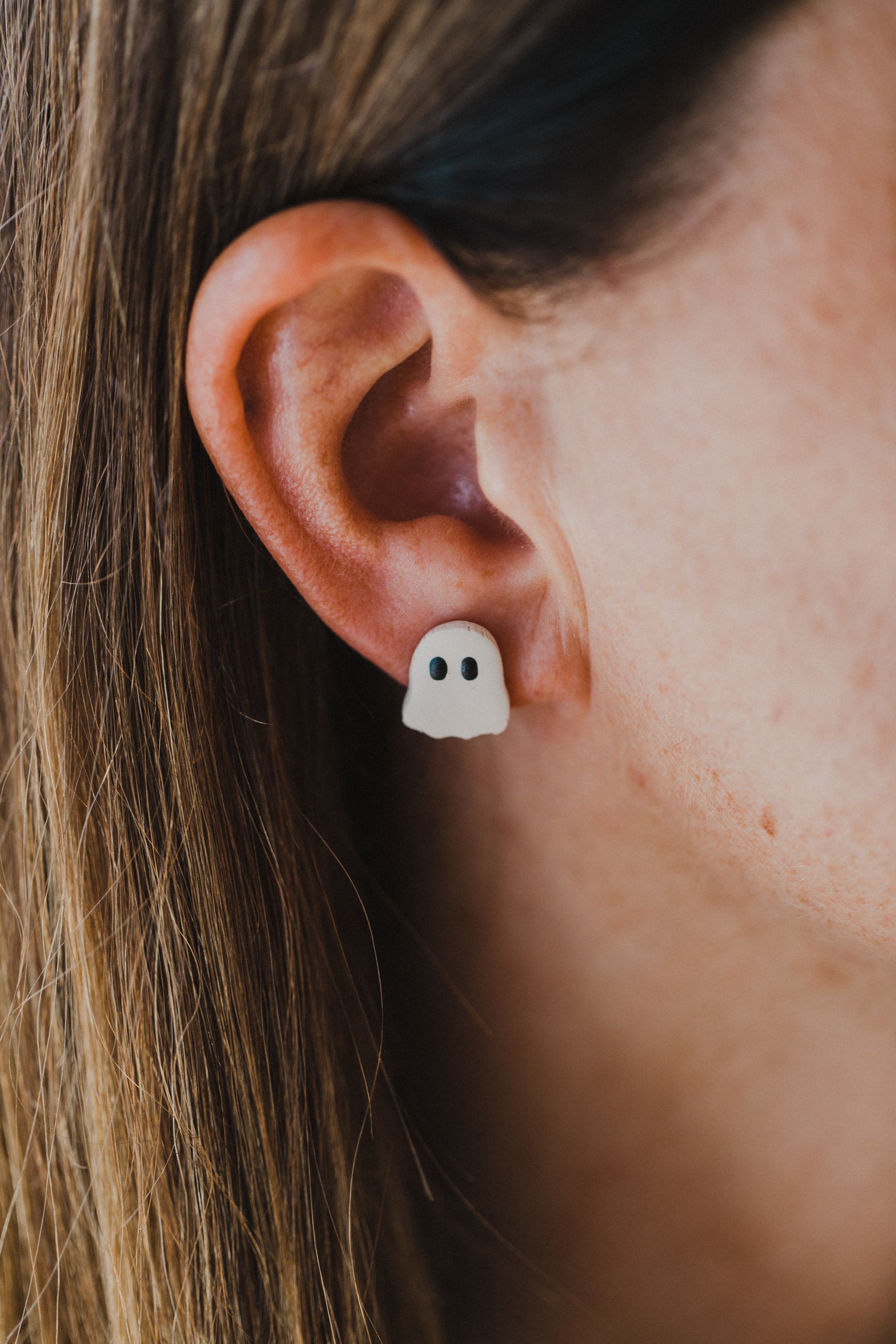 golden earrings with acrylic in white, petrol and brown
