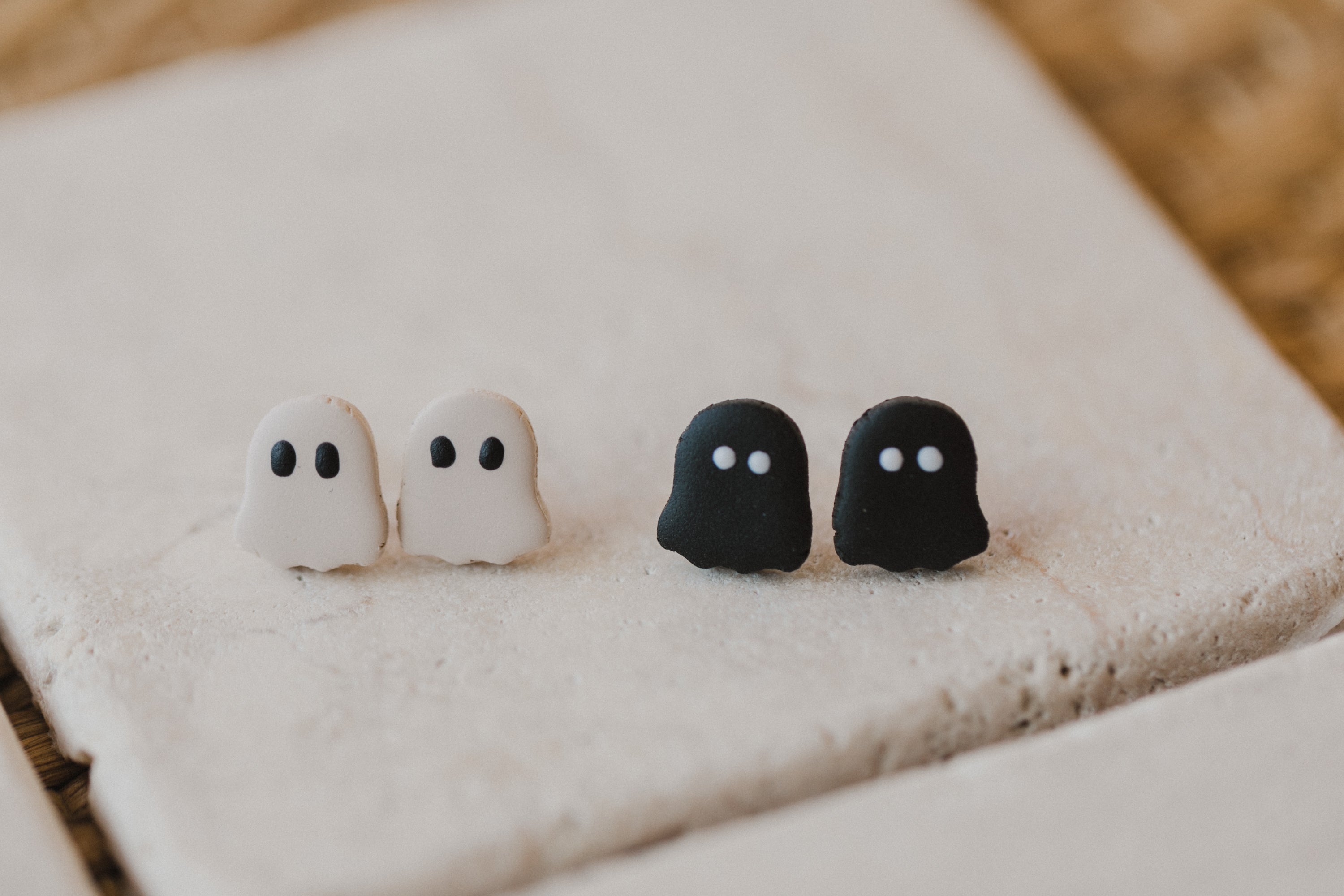 golden earrings with acrylic in white, petrol and brown