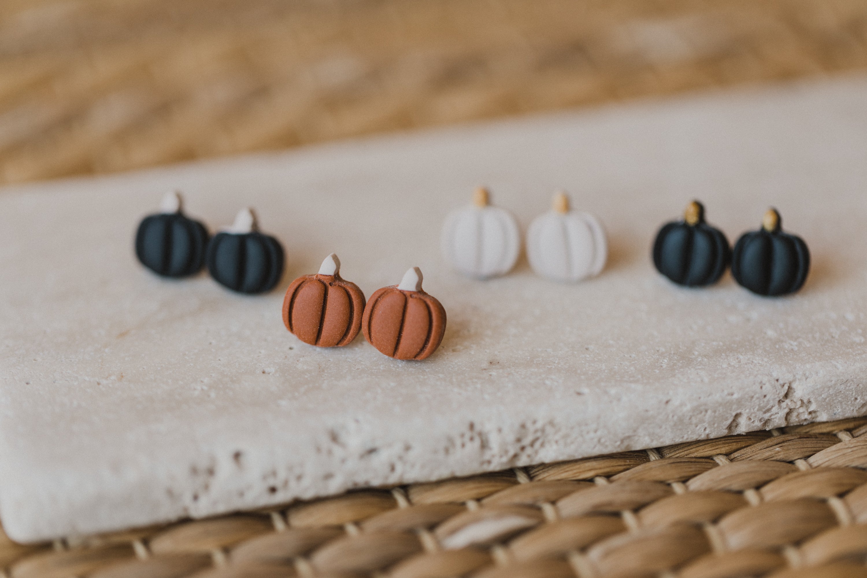 golden earrings with acrylic in white, petrol and brown