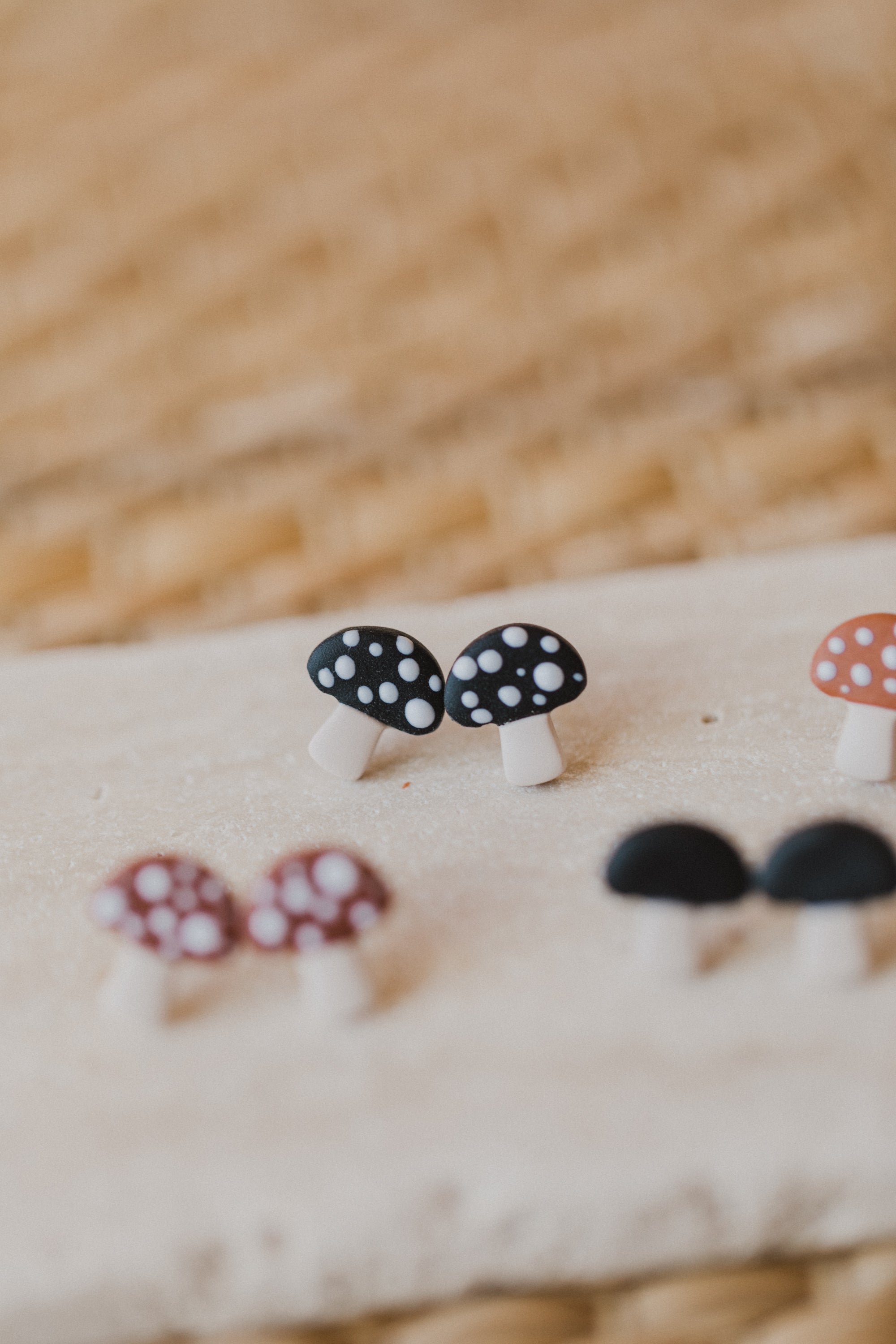 golden earrings with acrylic in white, petrol and brown