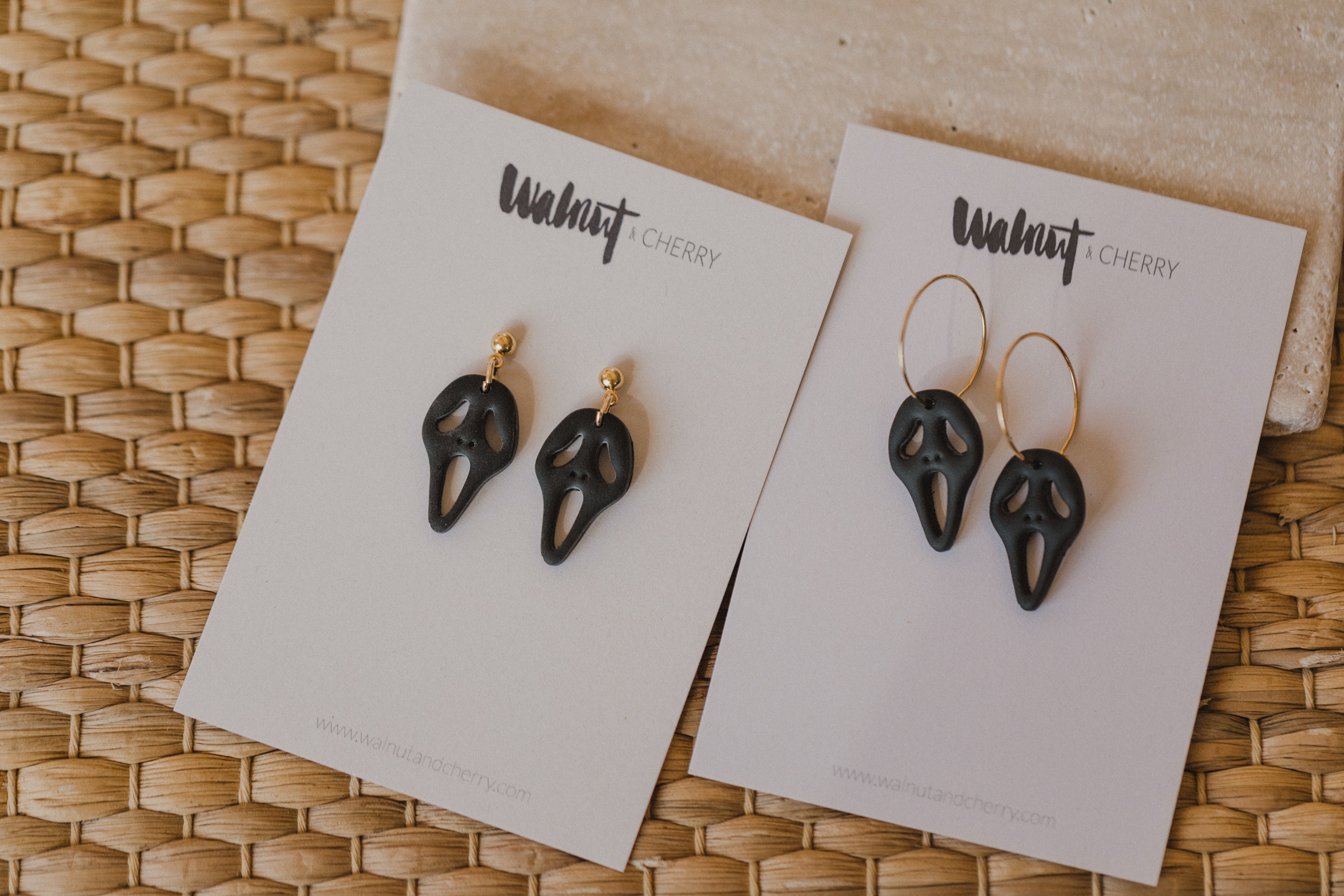 golden earrings with acrylic in white, petrol and brown