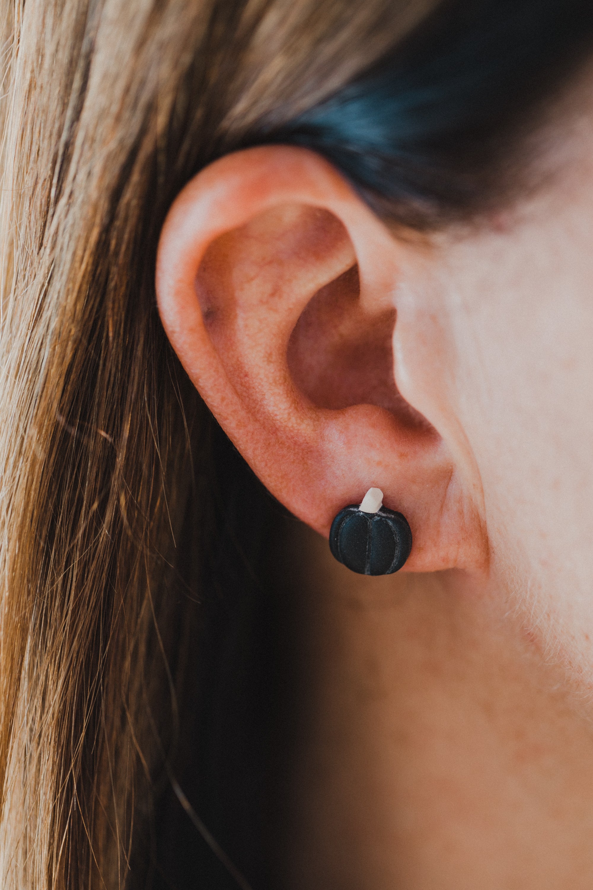 golden earrings with acrylic in white, petrol and brown