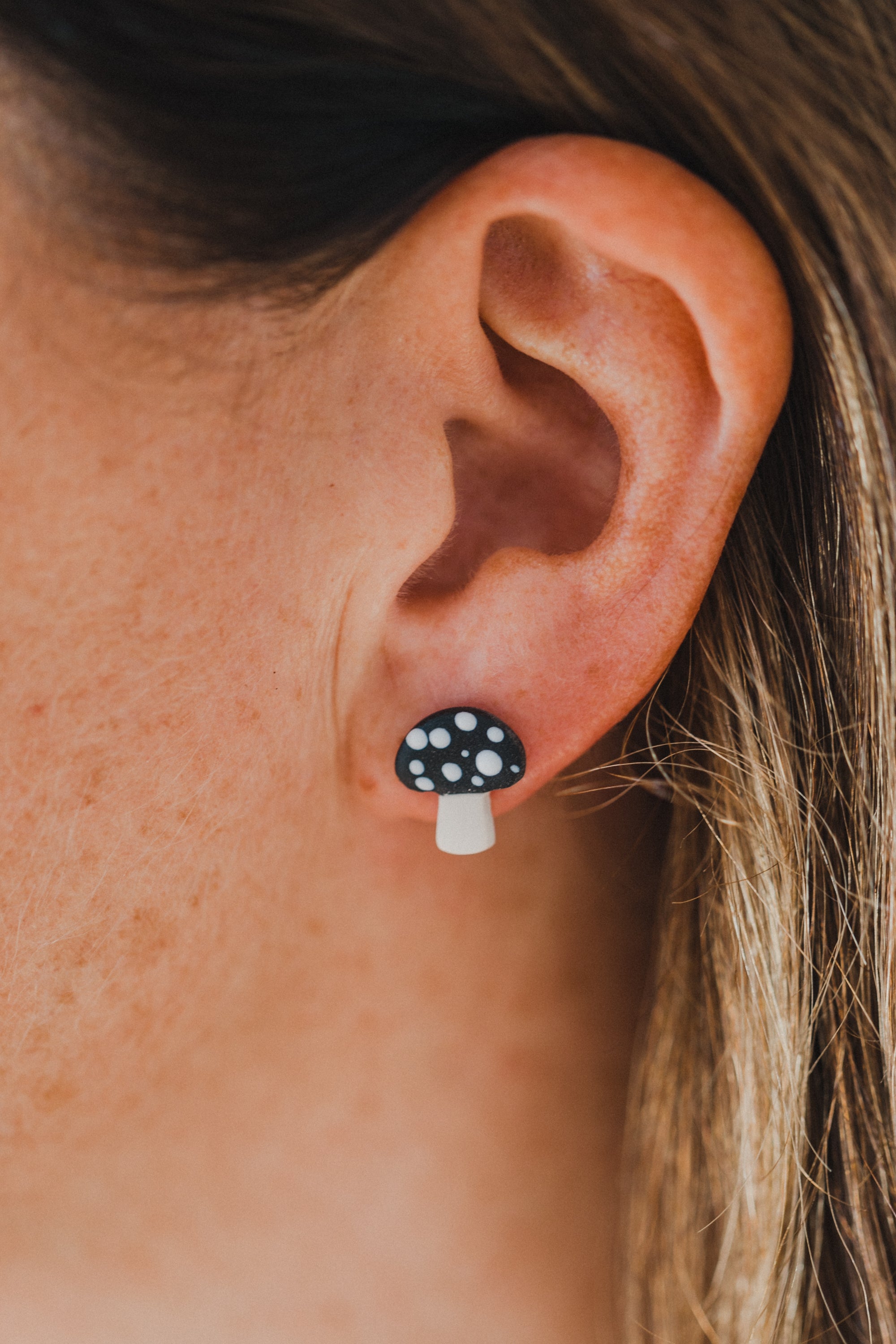 golden earrings with acrylic in white, petrol and brown