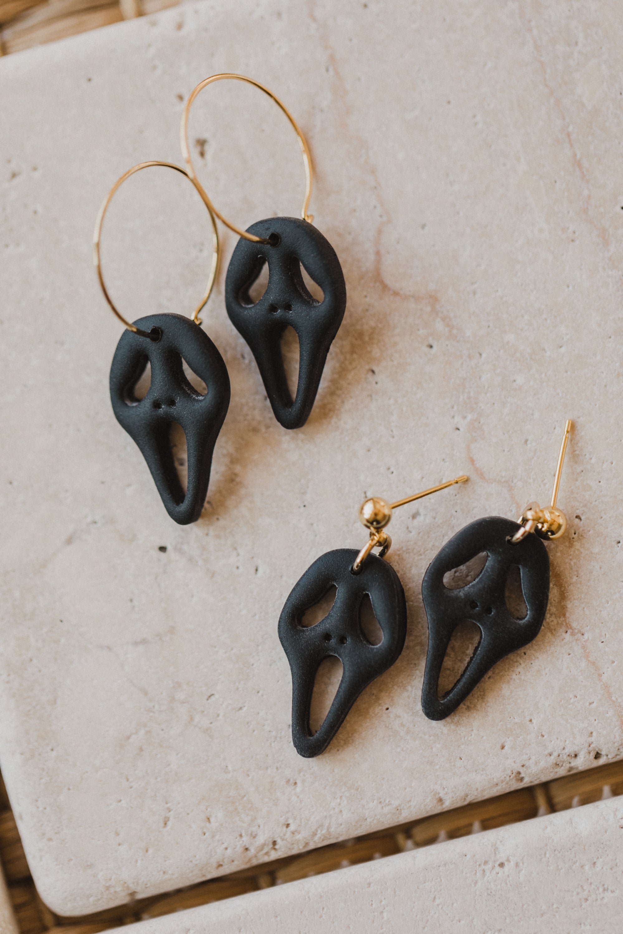 golden earrings with acrylic in white, petrol and brown