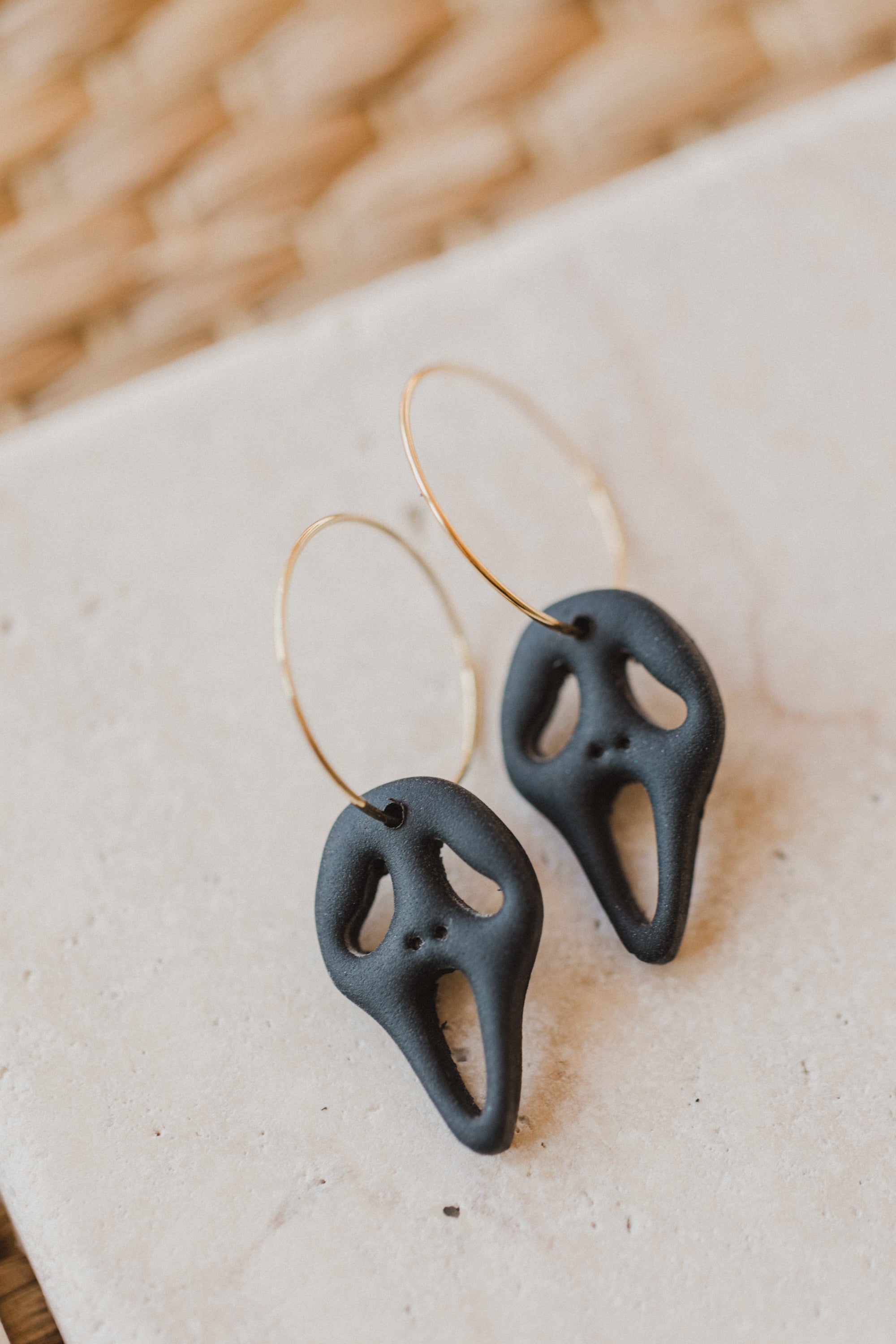 golden earrings with acrylic in white, petrol and brown