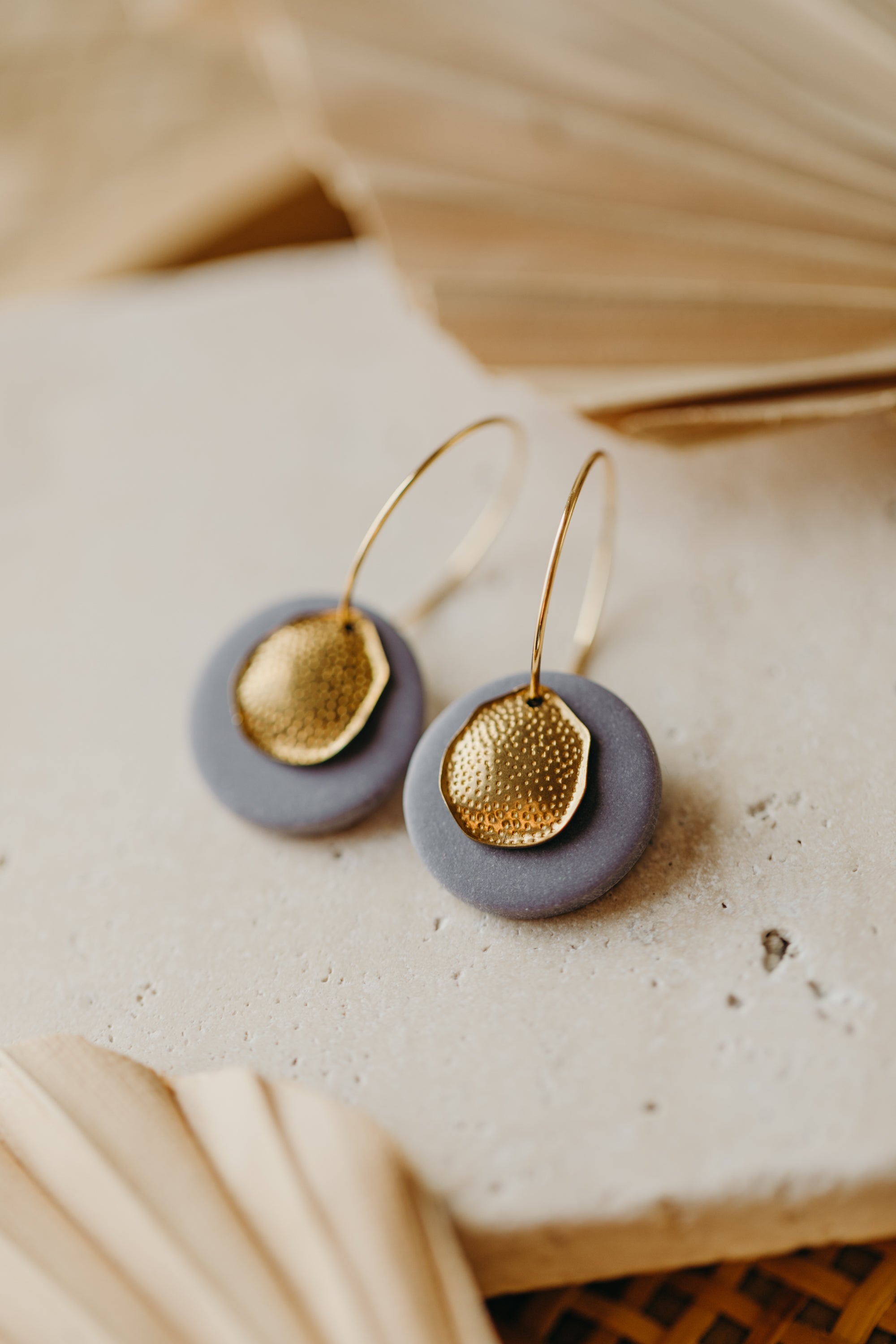 Hoop earrings with round polymer clay pendant and leaf