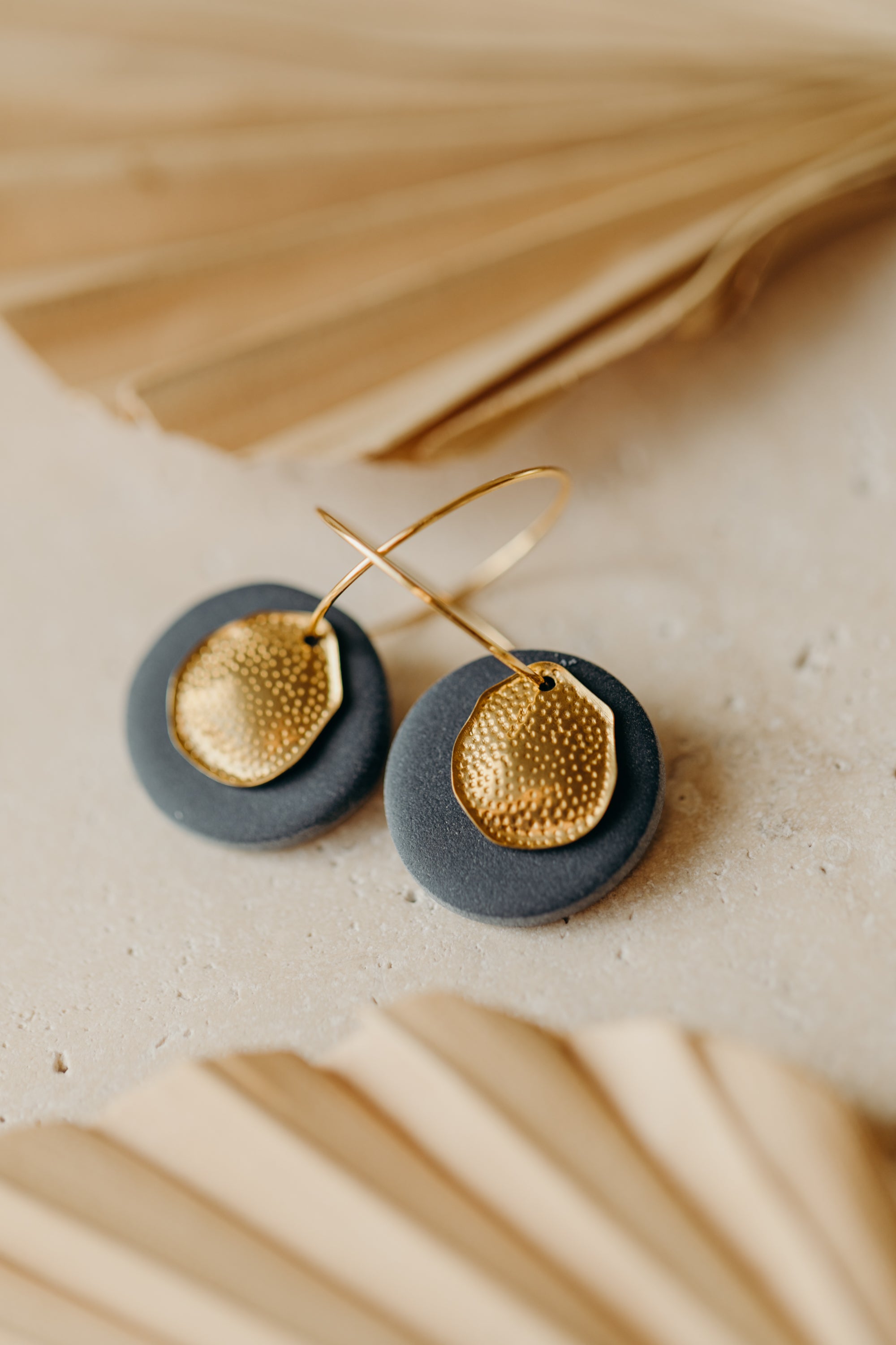 Hoop earrings with round polymer clay pendant and leaf