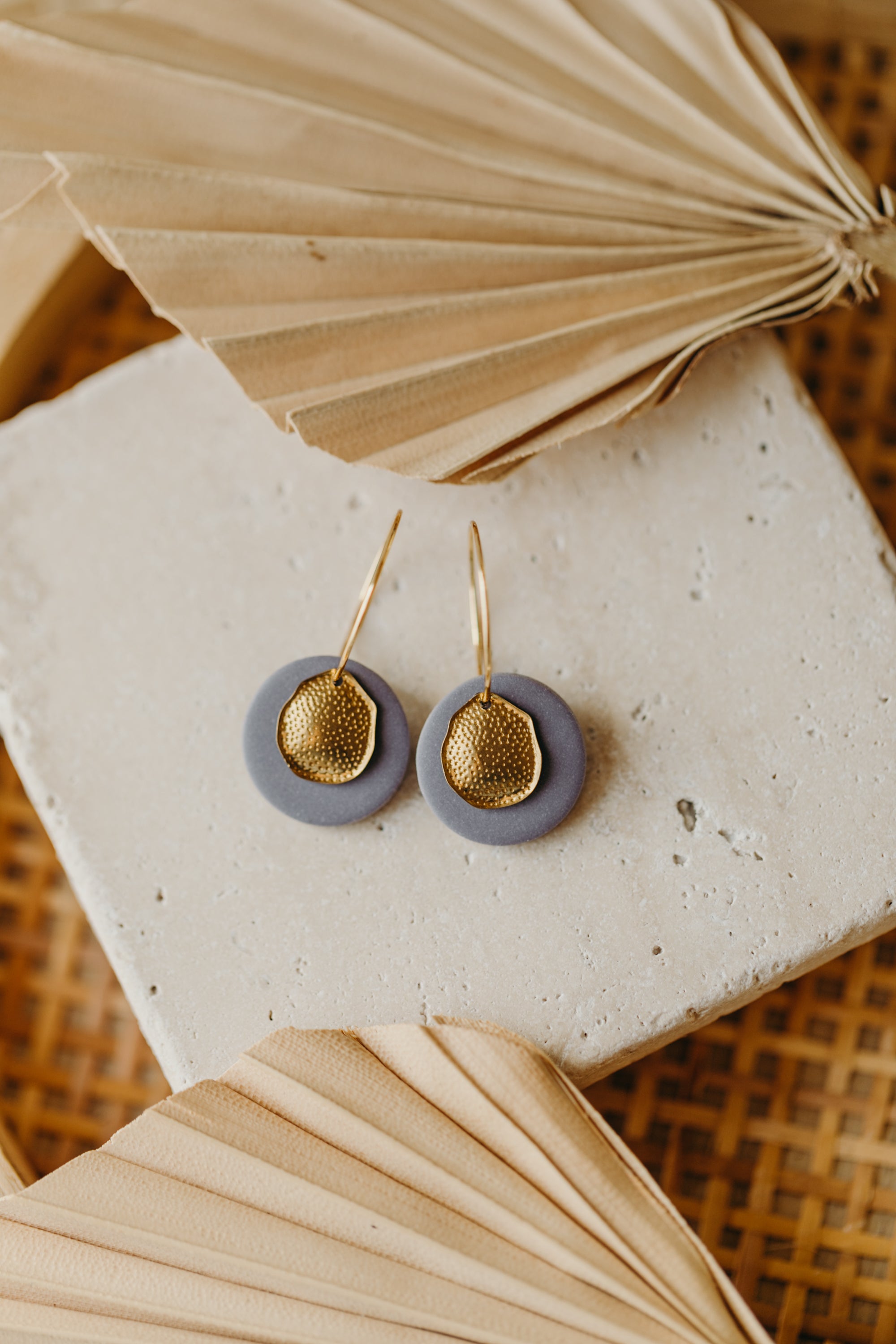 Hoop earrings with round polymer clay pendant and leaf