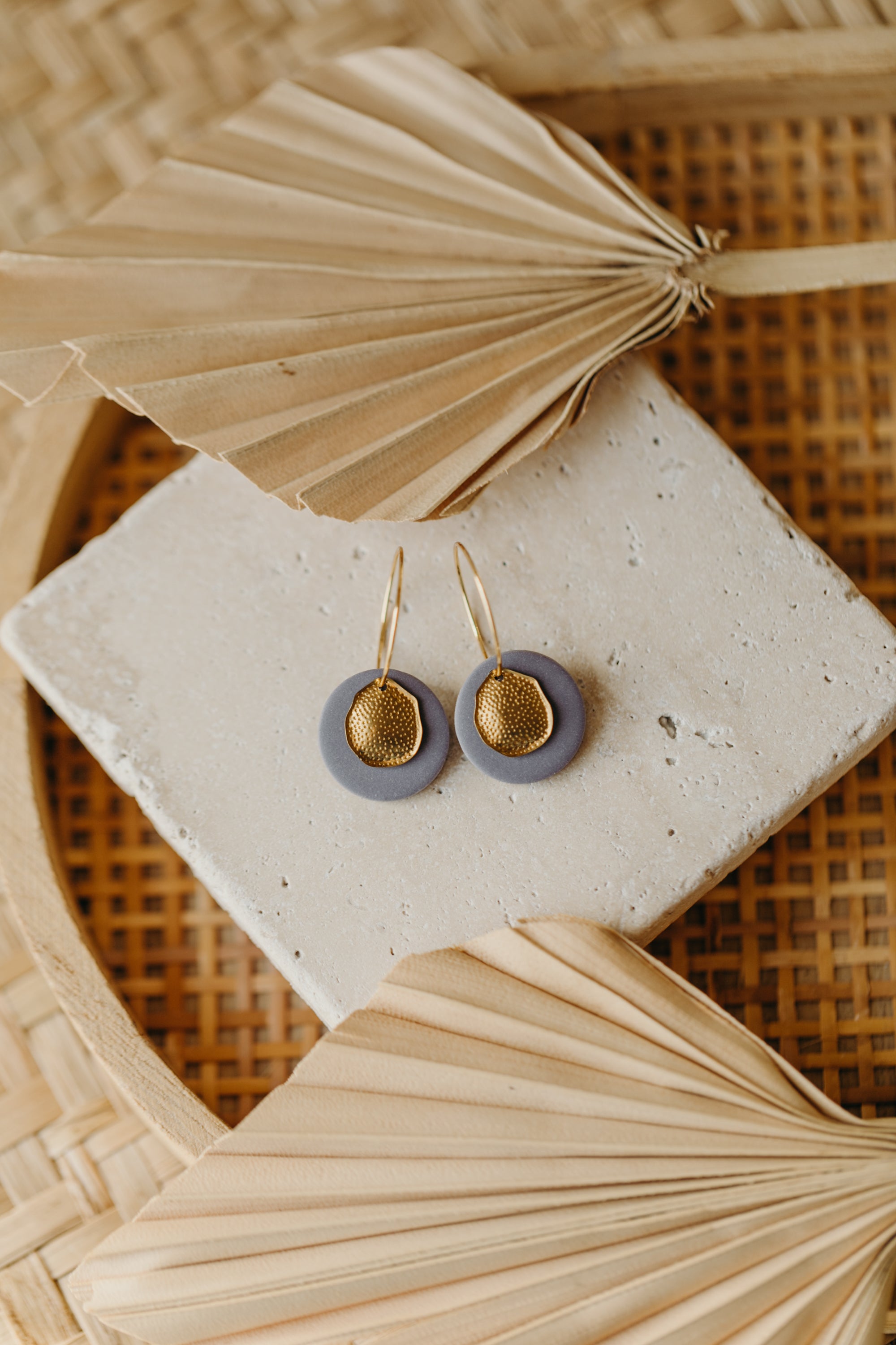Hoop earrings with round polymer clay pendant and leaf