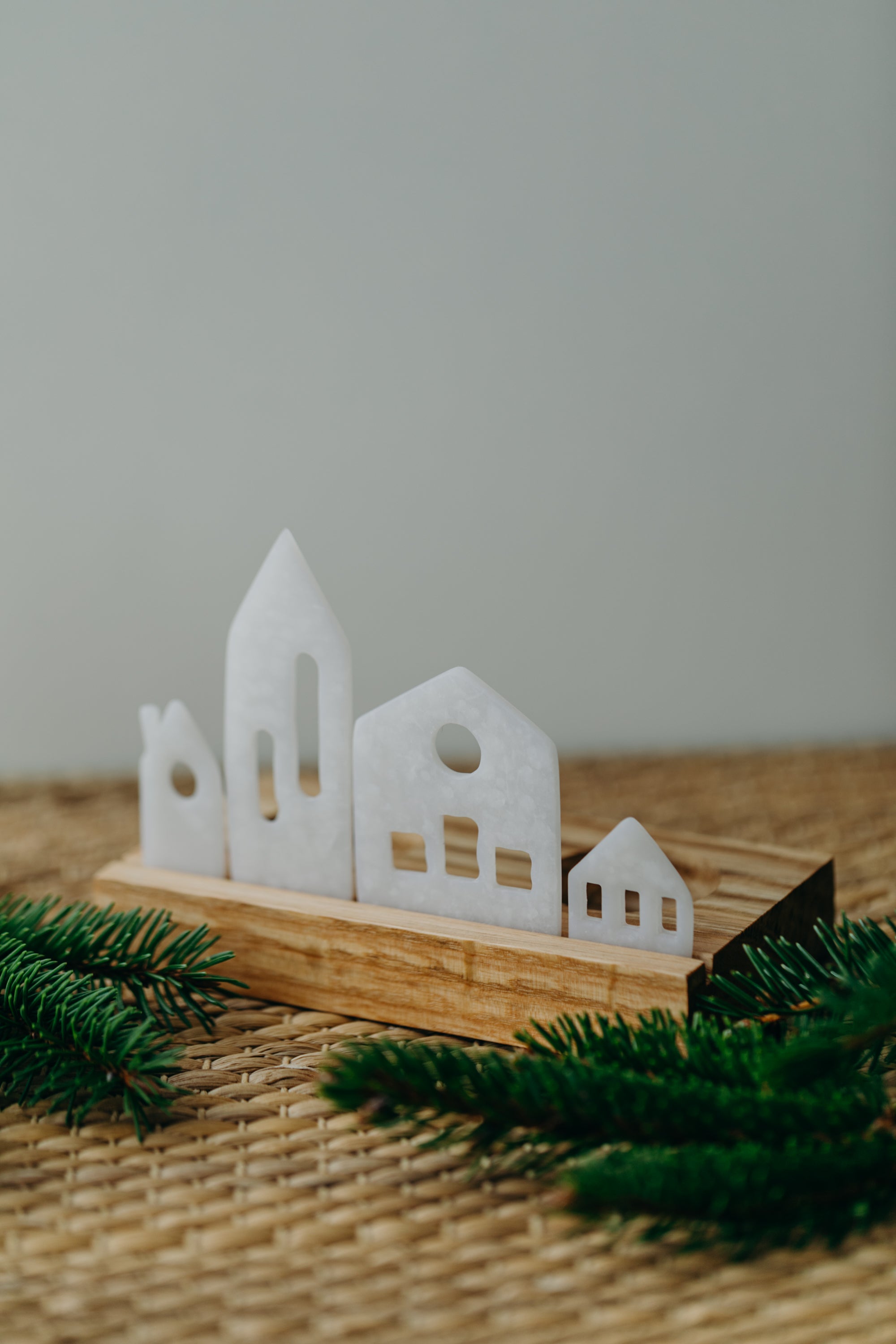 small white light houses made of polymer clay