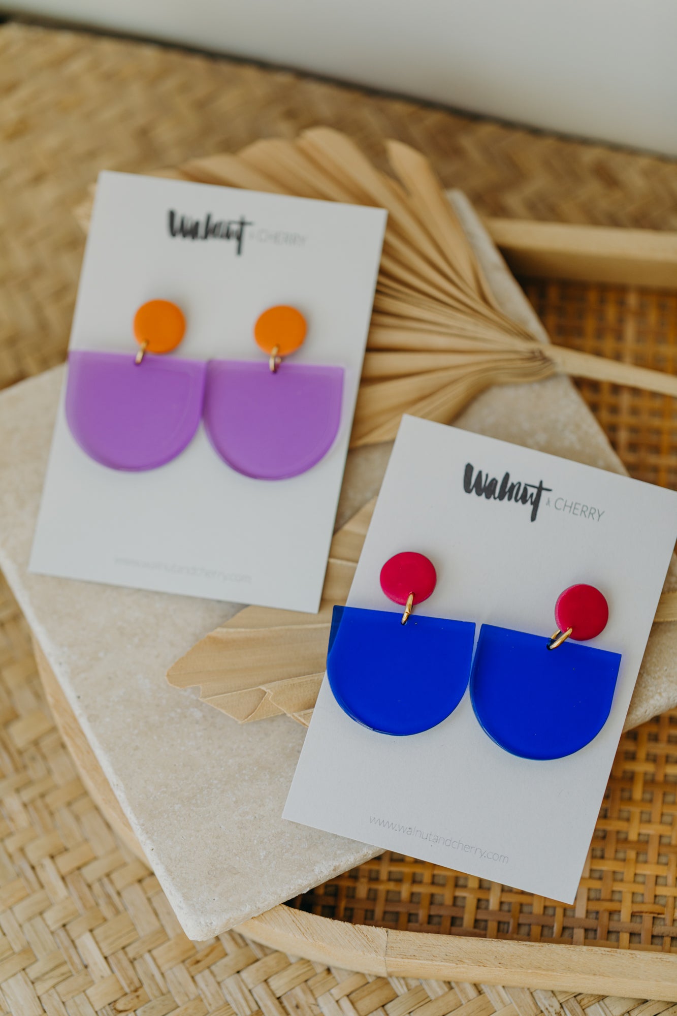 MELA – Statement-Ohrringe in Orange & Lila