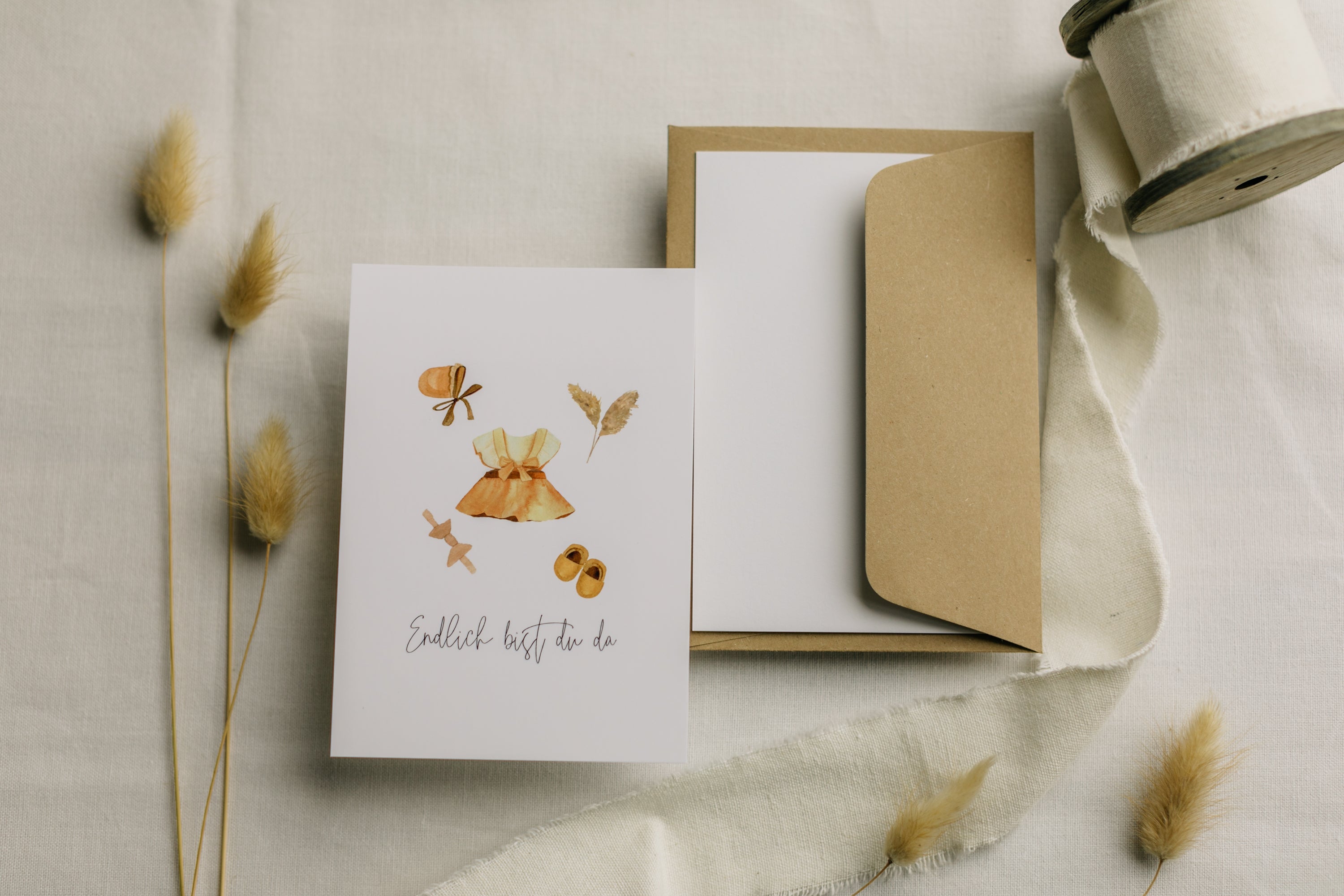 Postcard baby motifs girl with the print "Finally you are here"