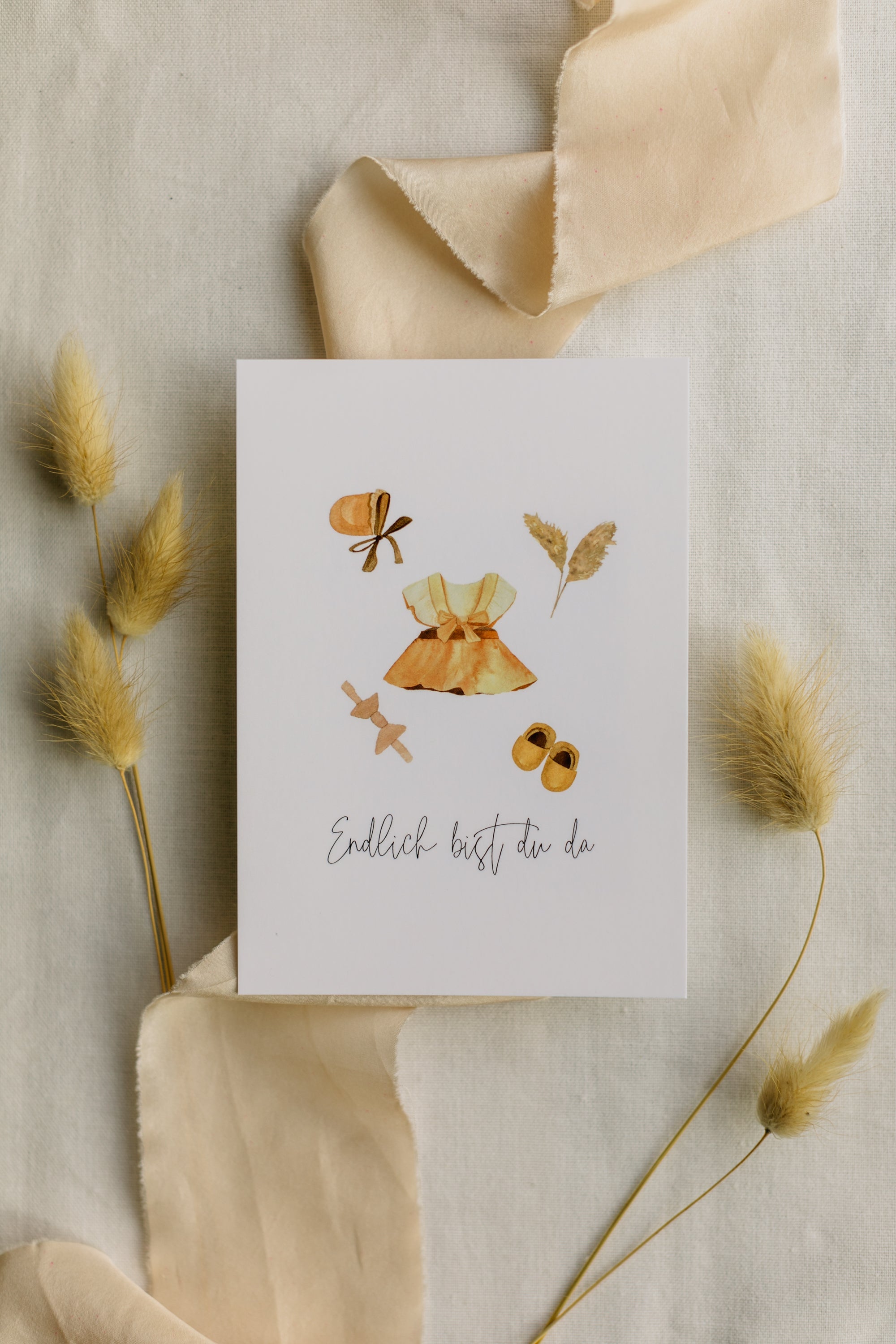 Postcard baby motifs girl with the print "Finally you are here"