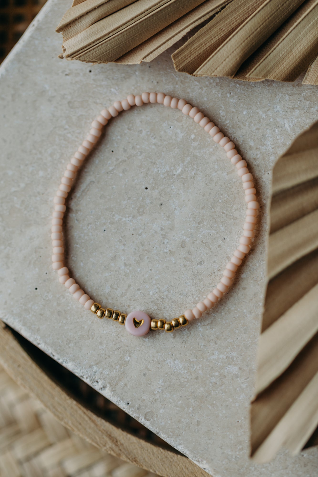 Herz Perlenarmband in apricot