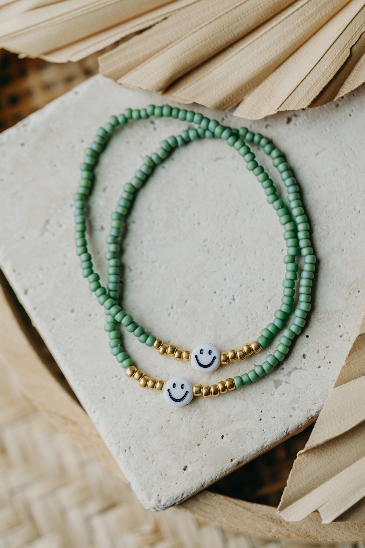 Smiley Perlenarmband in Grün
