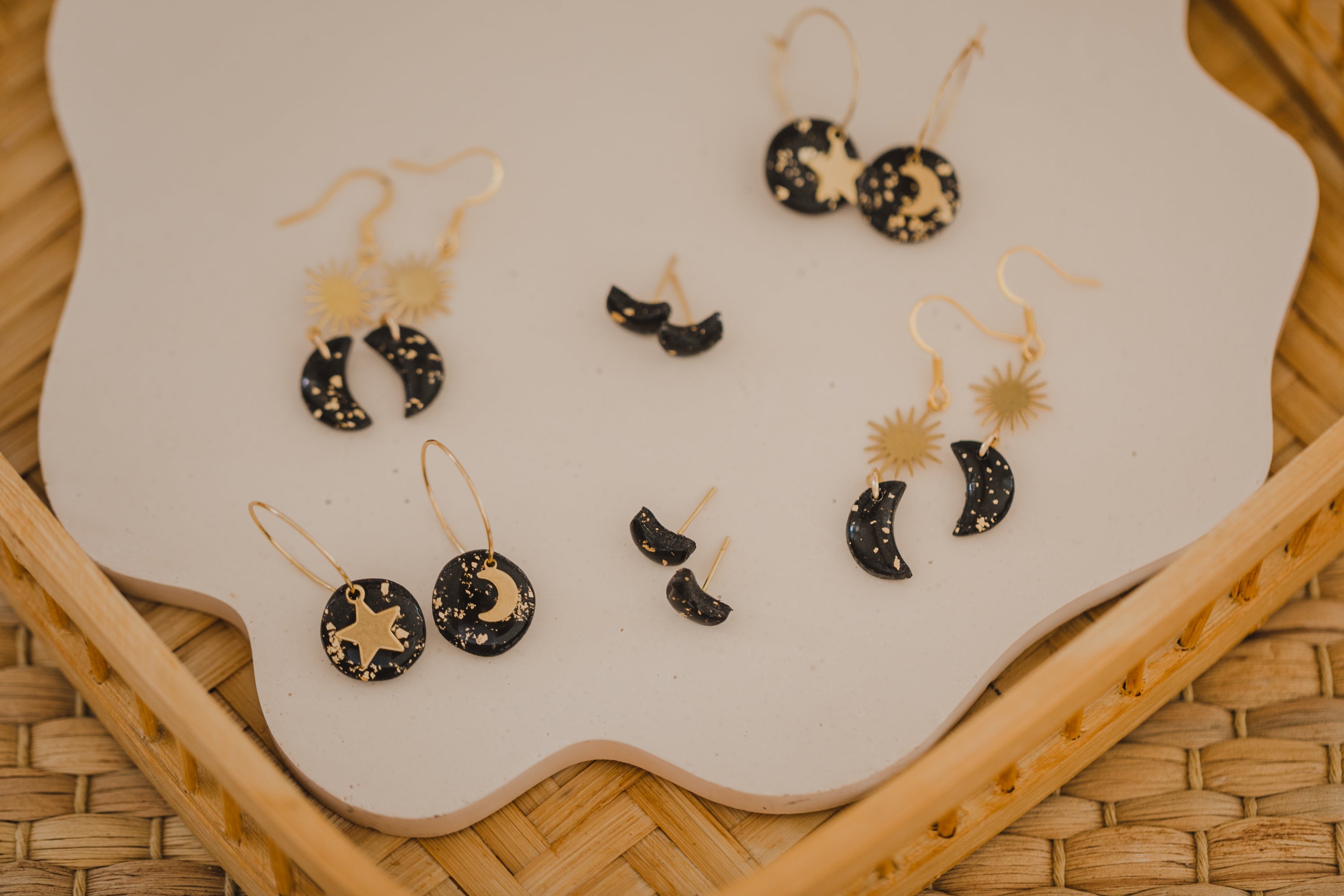 Hoop earrings with round polymer clay pendant and leaf