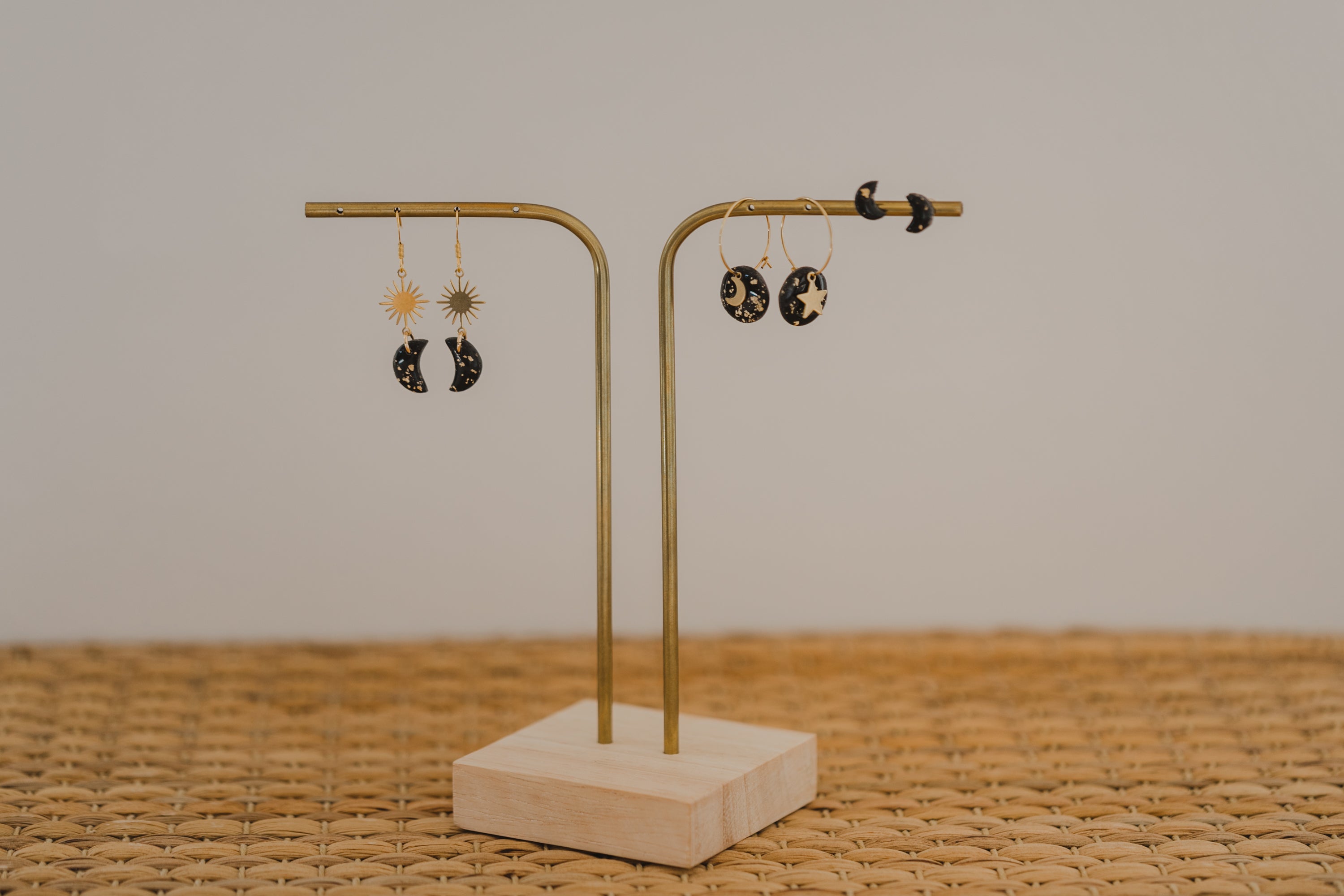 Hoop earrings with round polymer clay pendant and leaf