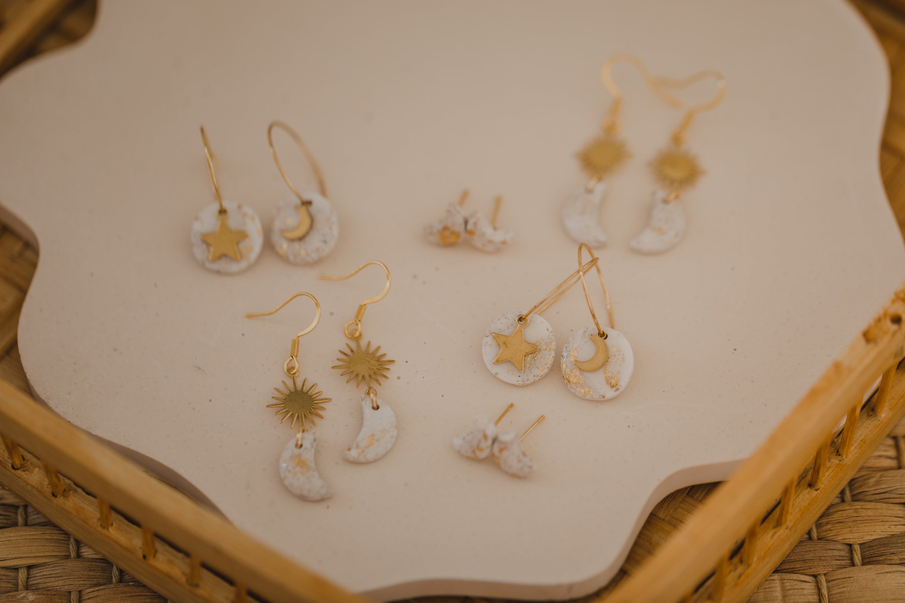 Hoop earrings with round polymer clay pendant and leaf