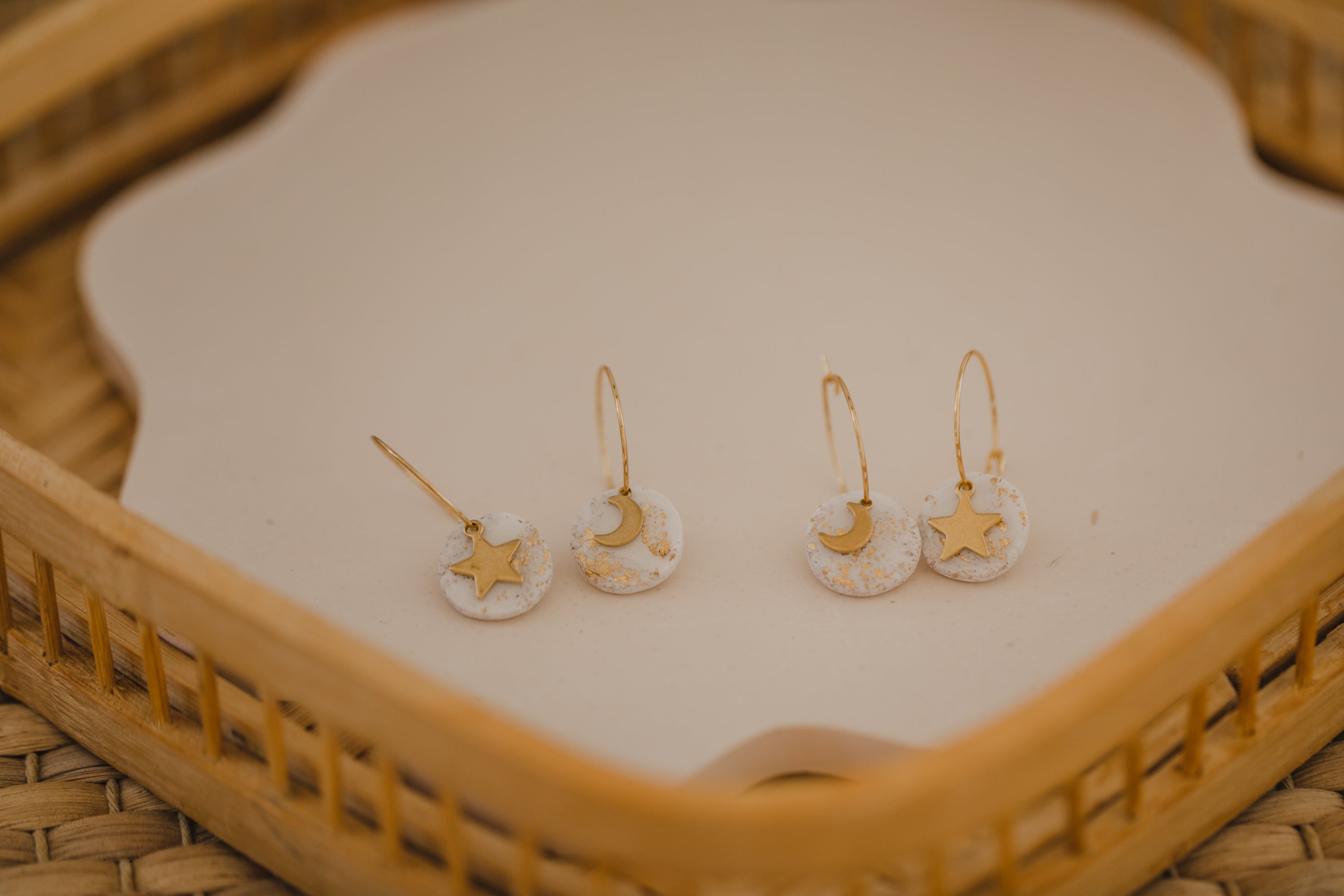 Hoop earrings with round polymer clay pendant and leaf