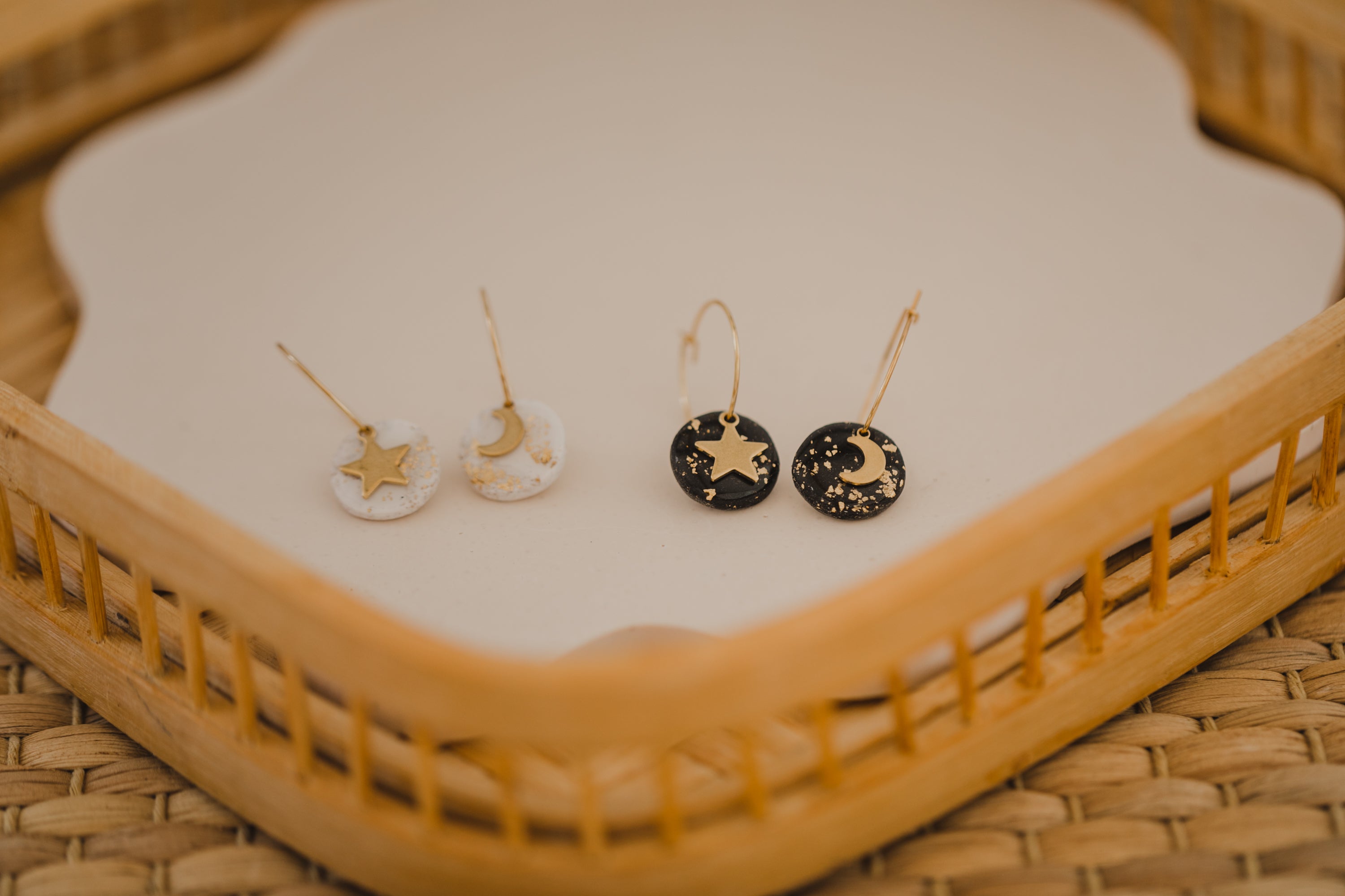 Hoop earrings with round polymer clay pendant and leaf