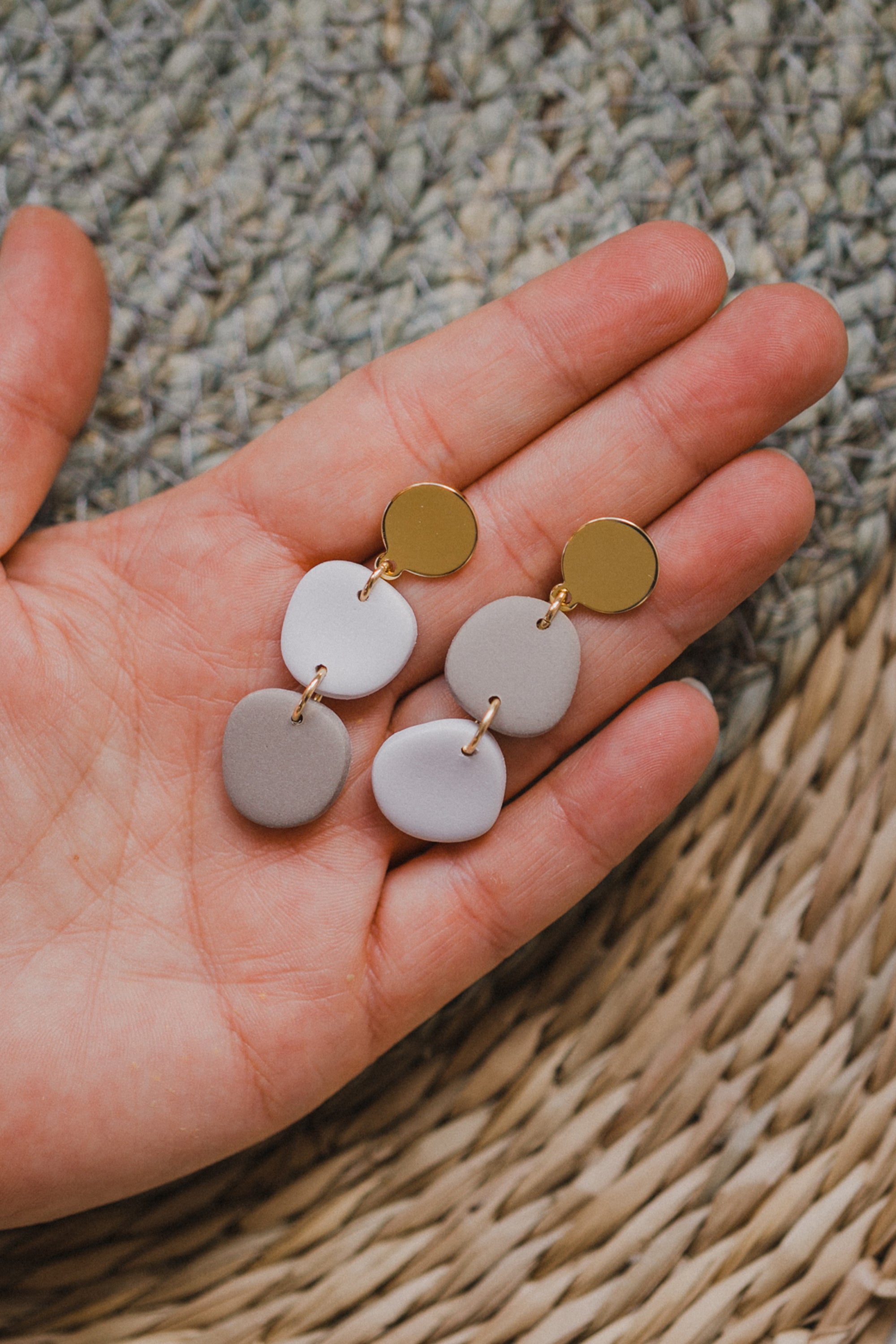 golden earrings with acrylic in white, petrol and brown