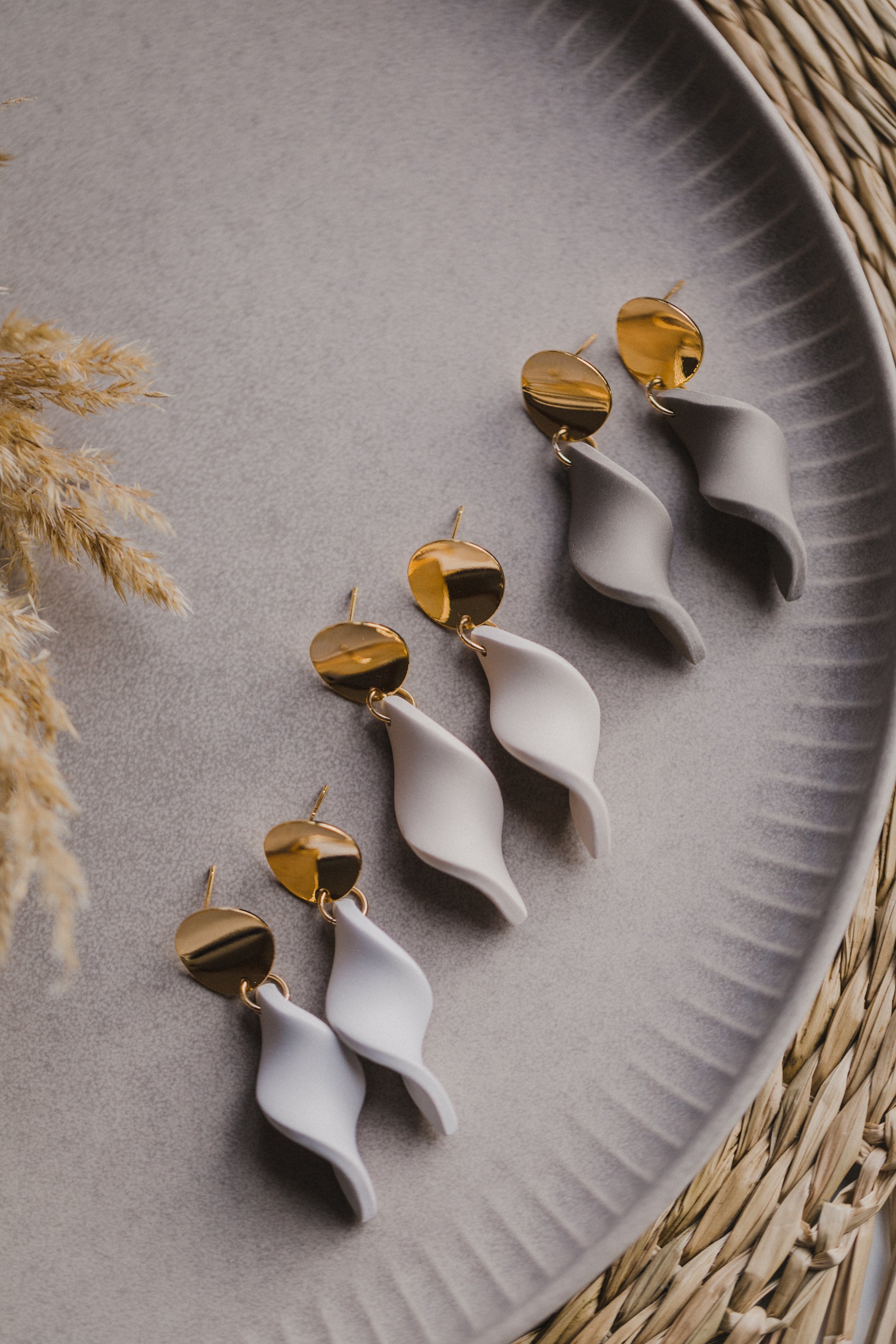 Hoop earrings with round polymer clay pendant and leaf