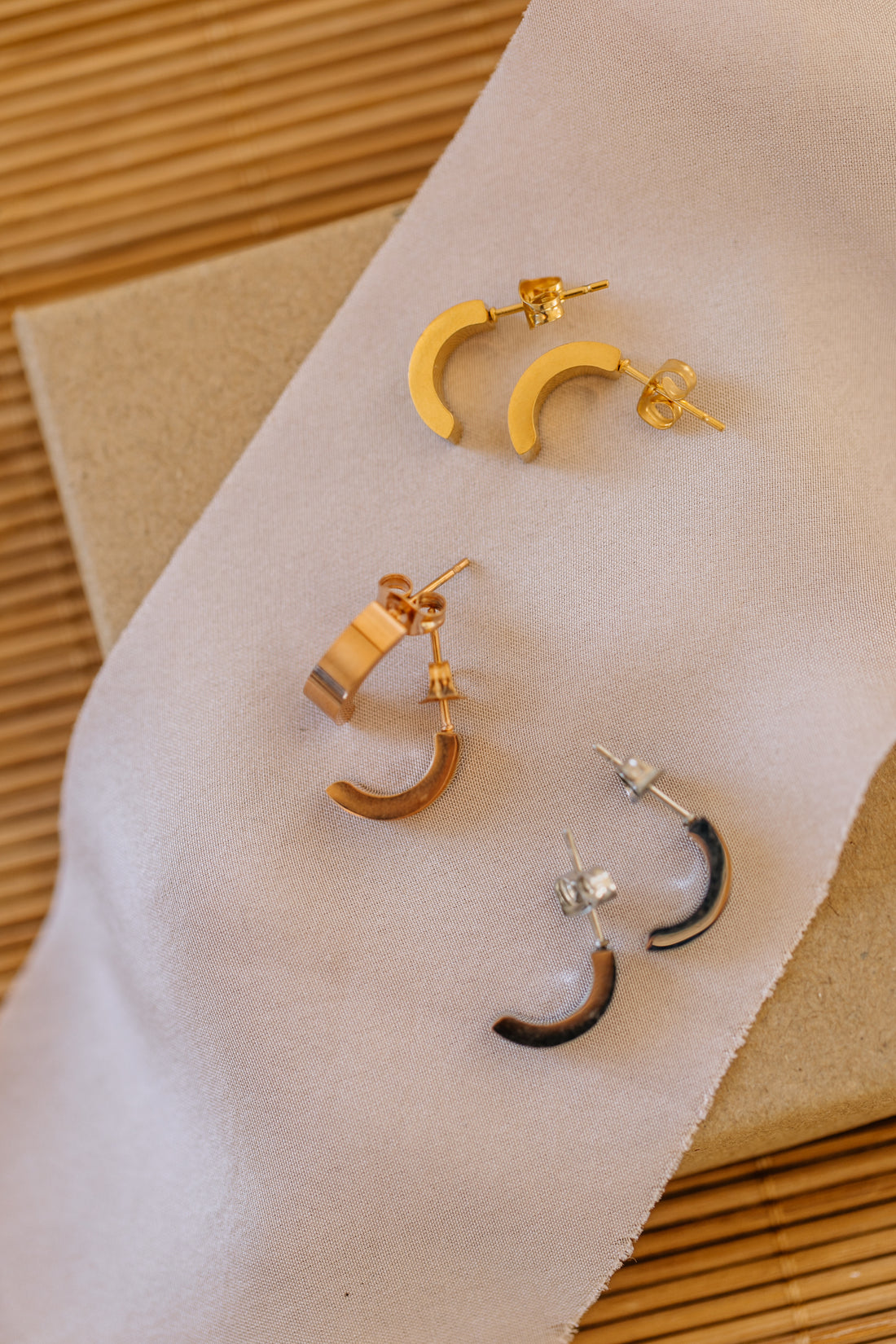 long bow earrings