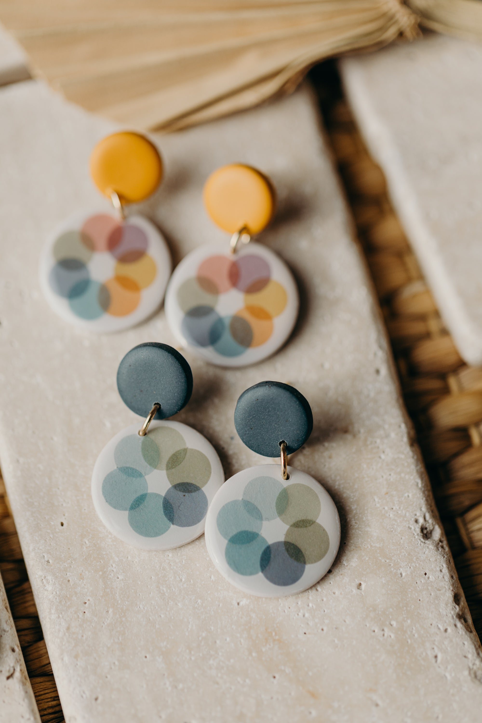 MARLA - round dark blue polymer clay earrings with blue and green dots
