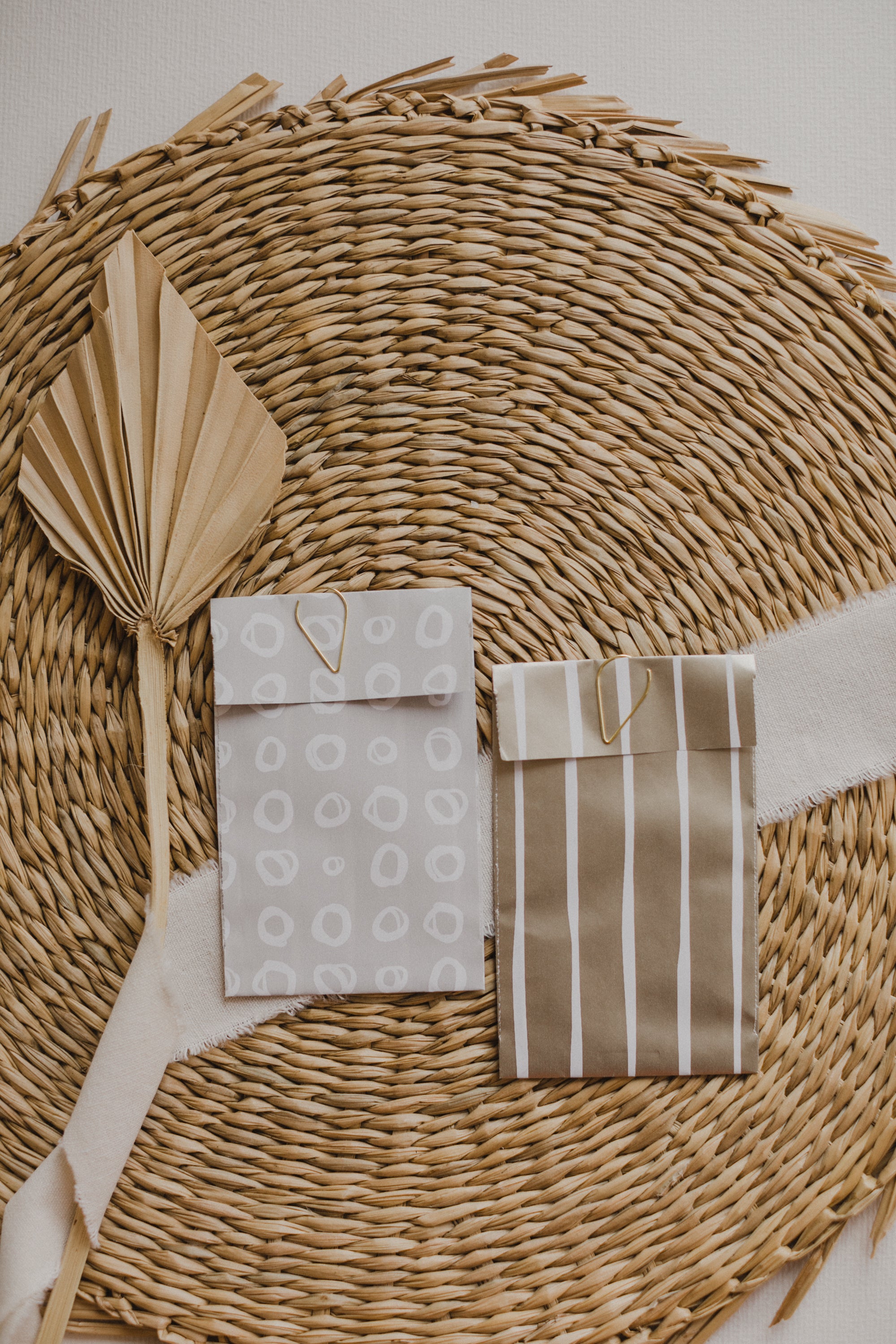 small golden paper bag with white dots