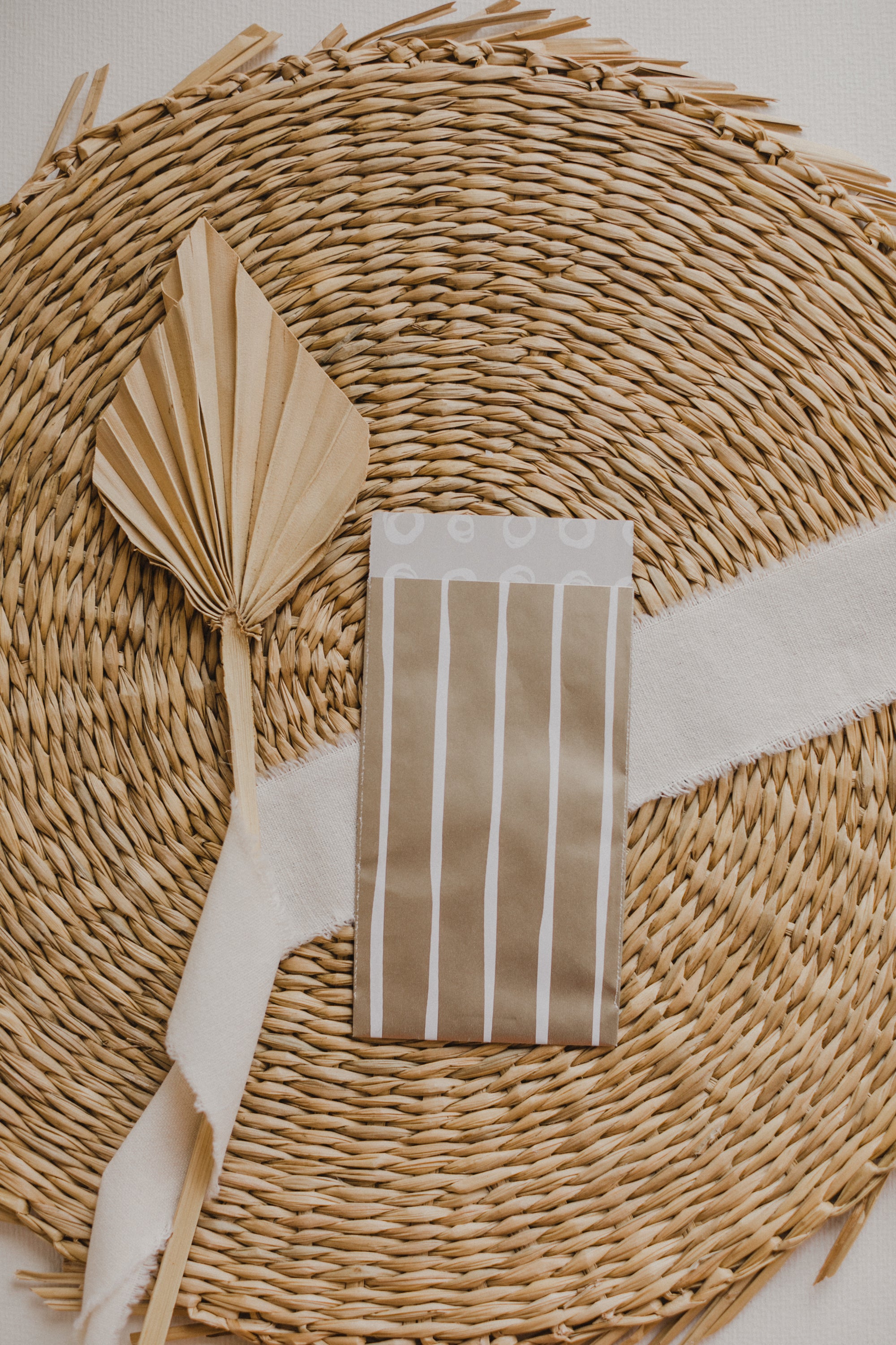 small golden paper bag with white dots