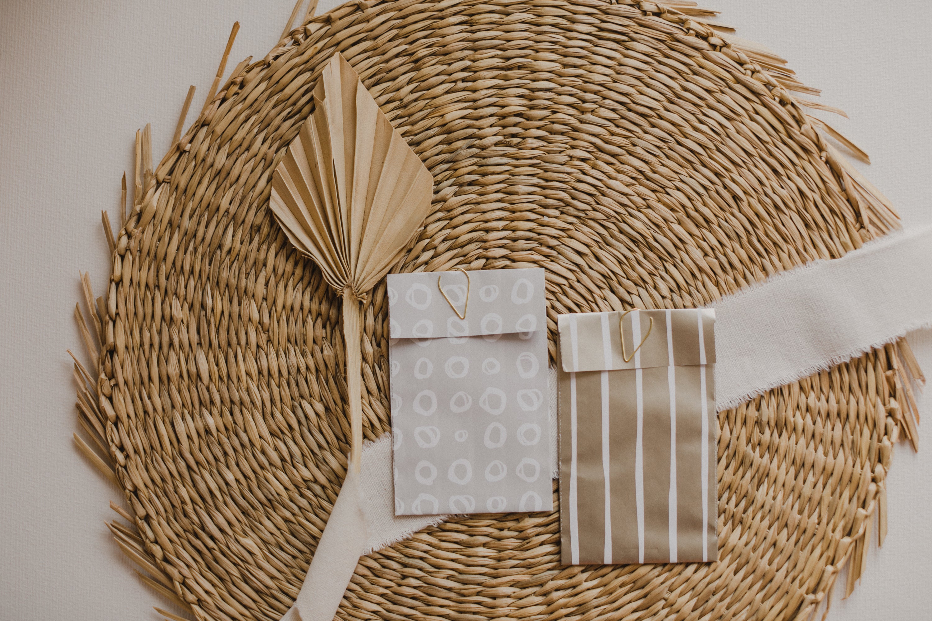 small golden paper bag with white dots