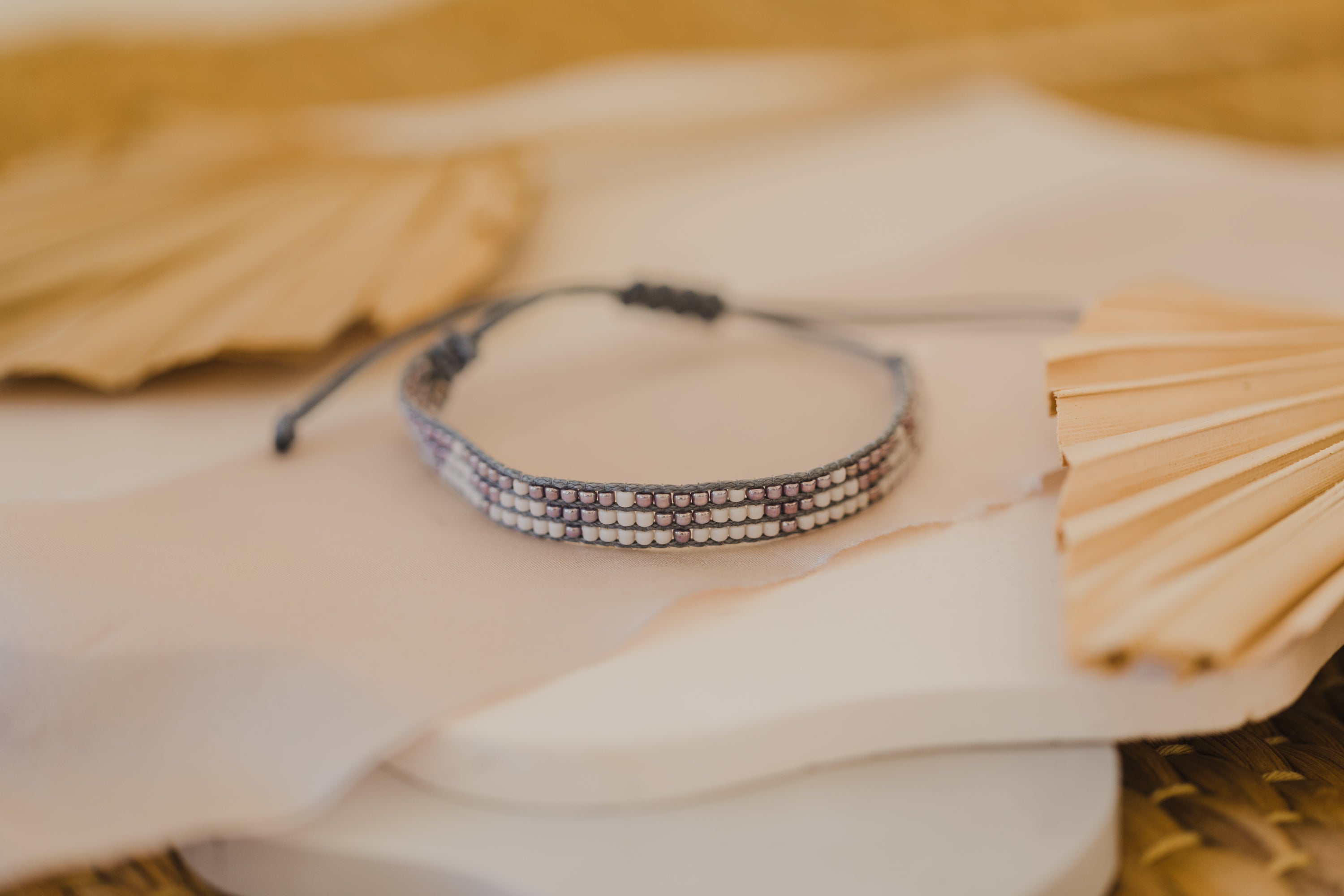 gray bracelet made of rocaille beads
